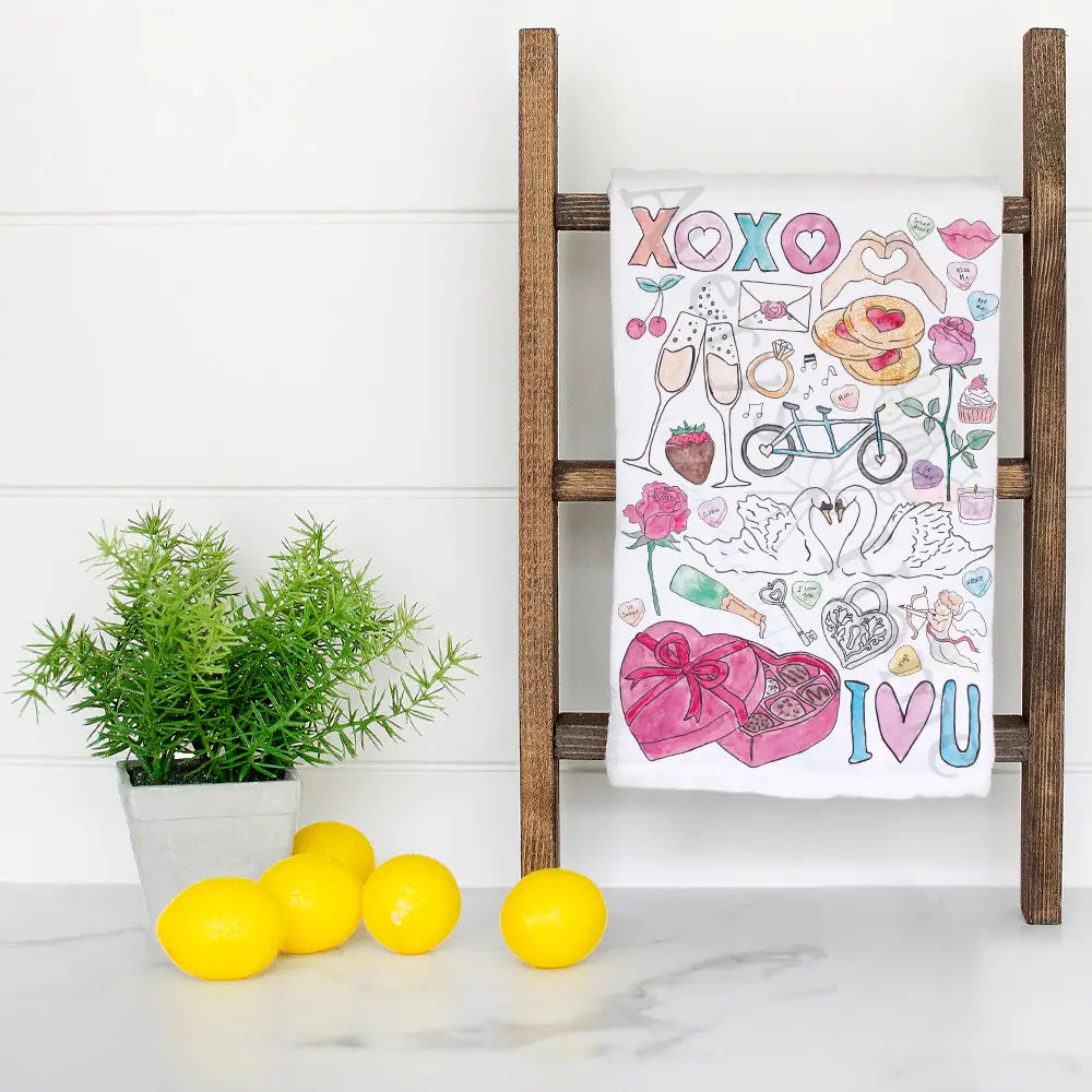 Valentine's Day Favorites dish towel hanging in the kitchen