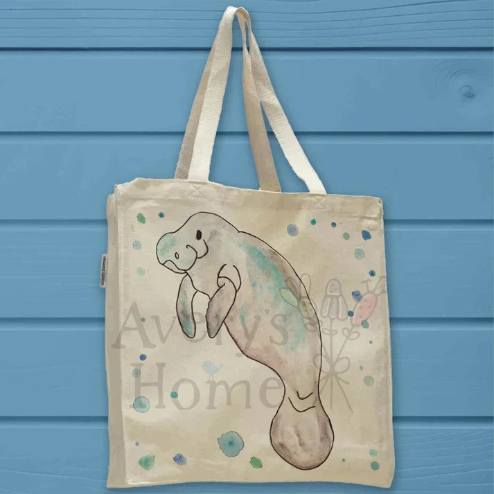 Manatee cotton tote bag, art by Avery Jackson