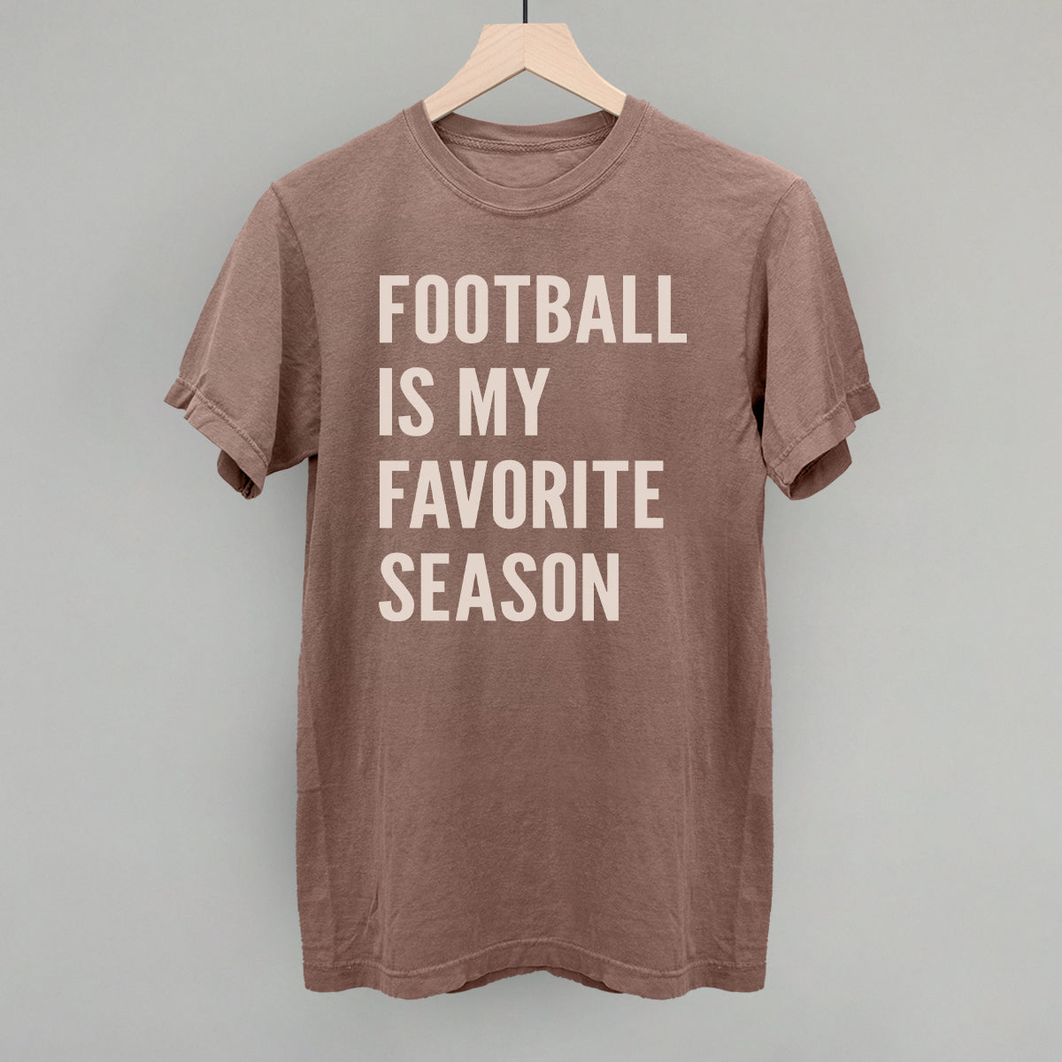 Football Is My Favorite Season design on an espresso Comfort Colors tee