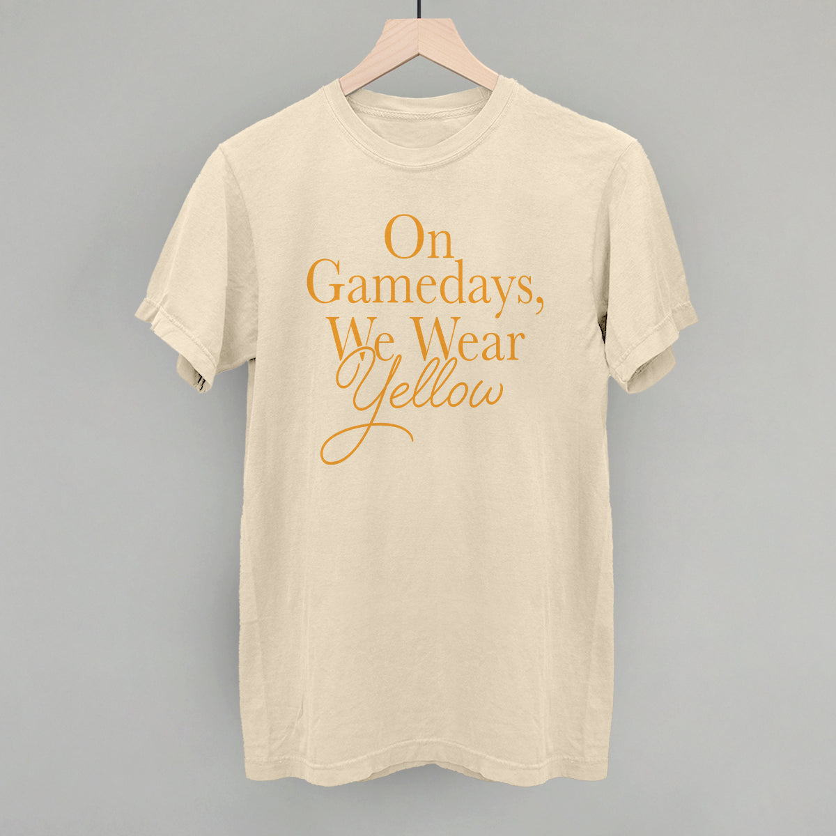 On Game Days We Wear Yellow design on an ivory Comfort Colors tee