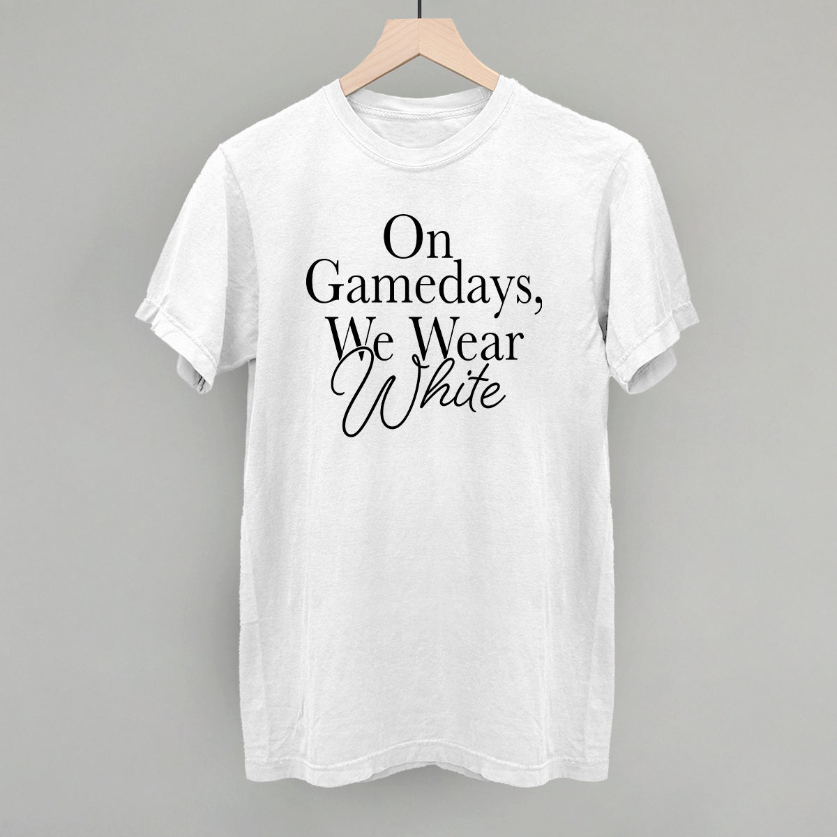 On Game Days We Wear White design on a white Comfort Colors garment dyed tee