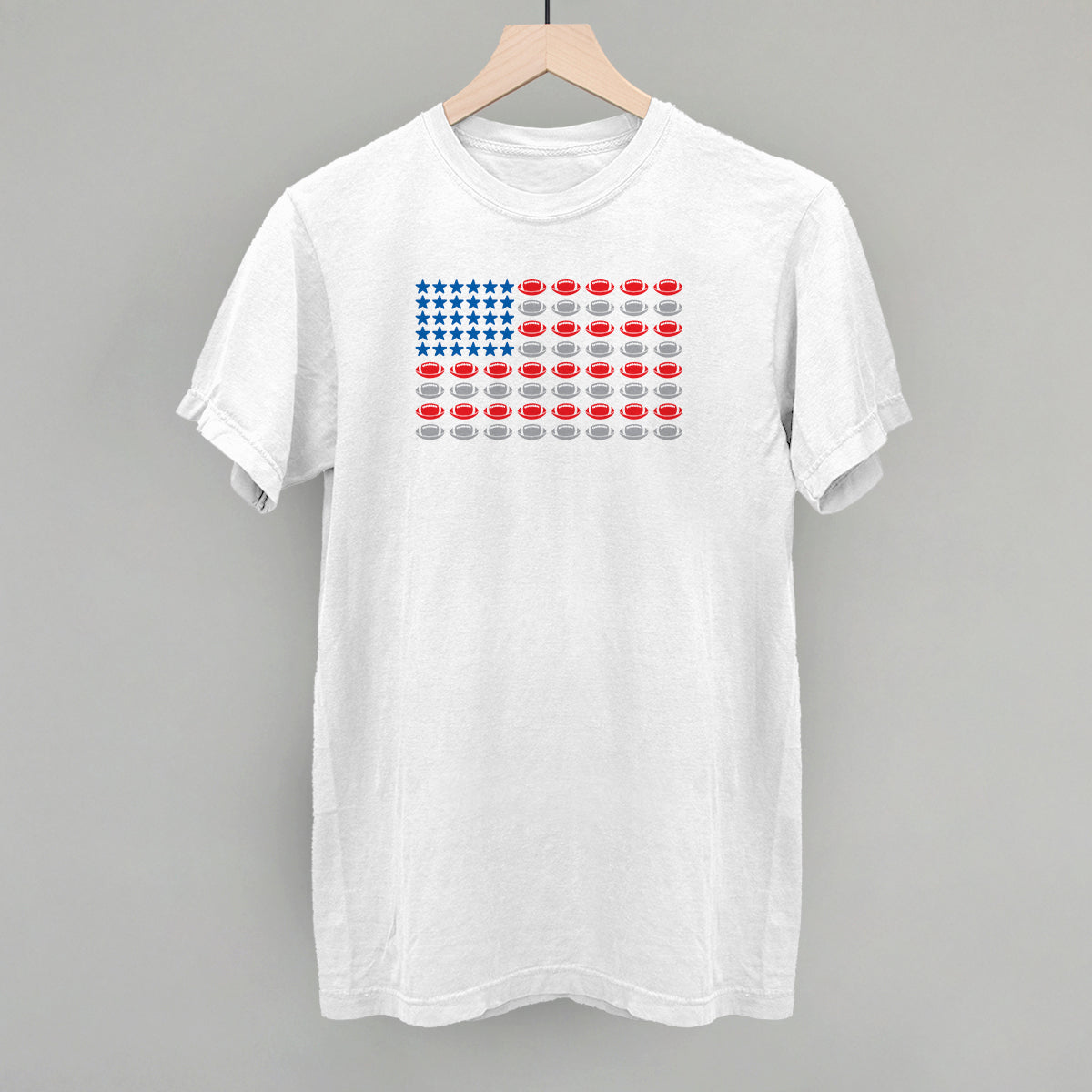 Football American flag design on a white Comfort Colors tee