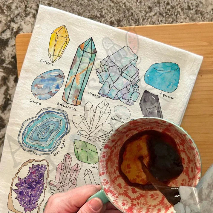 Crystal Gemstone Collector dish towel hanging in the kitchen