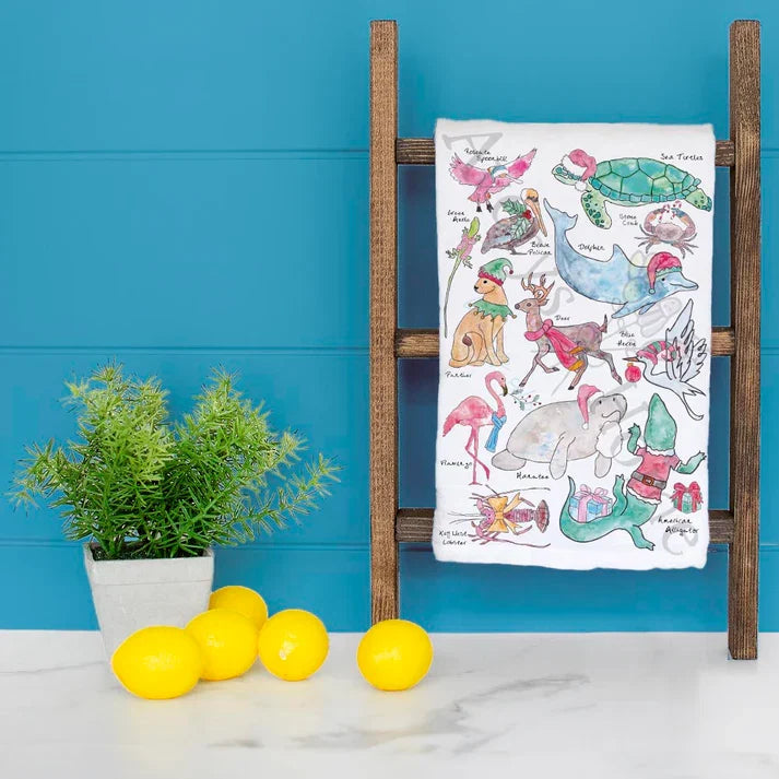 Christmas Florida Critters dish towel hanging in the kitchen