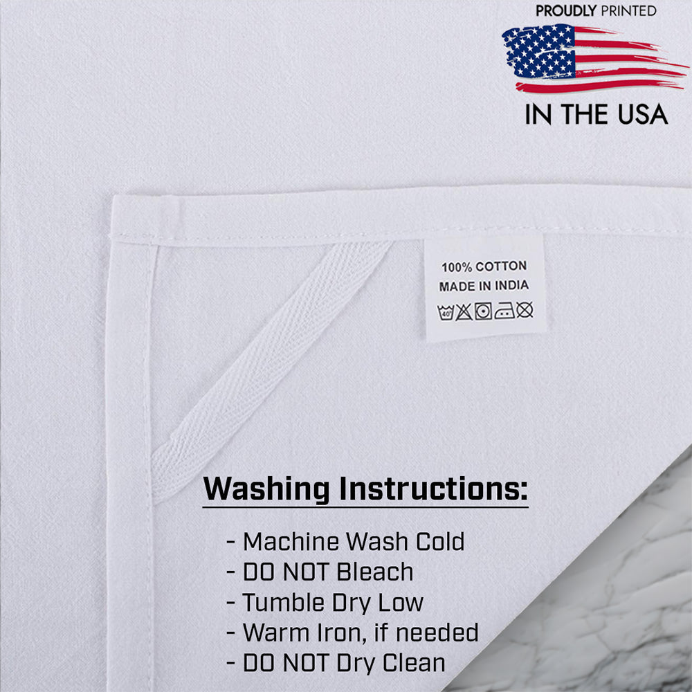 Pineapple Happiness dish towel hanging in the kitchen