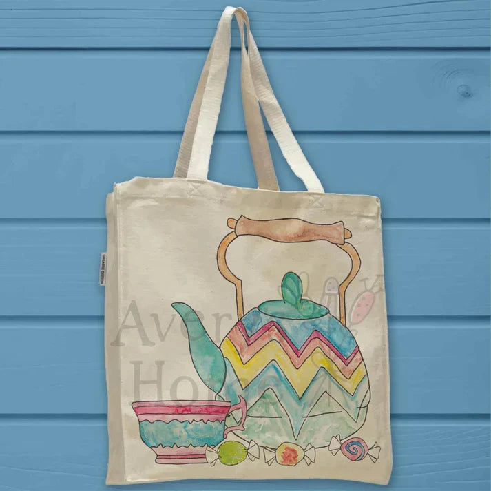 Tea Kettle, Teacup, and Candies cotton tote bag, art by Avery Jackson