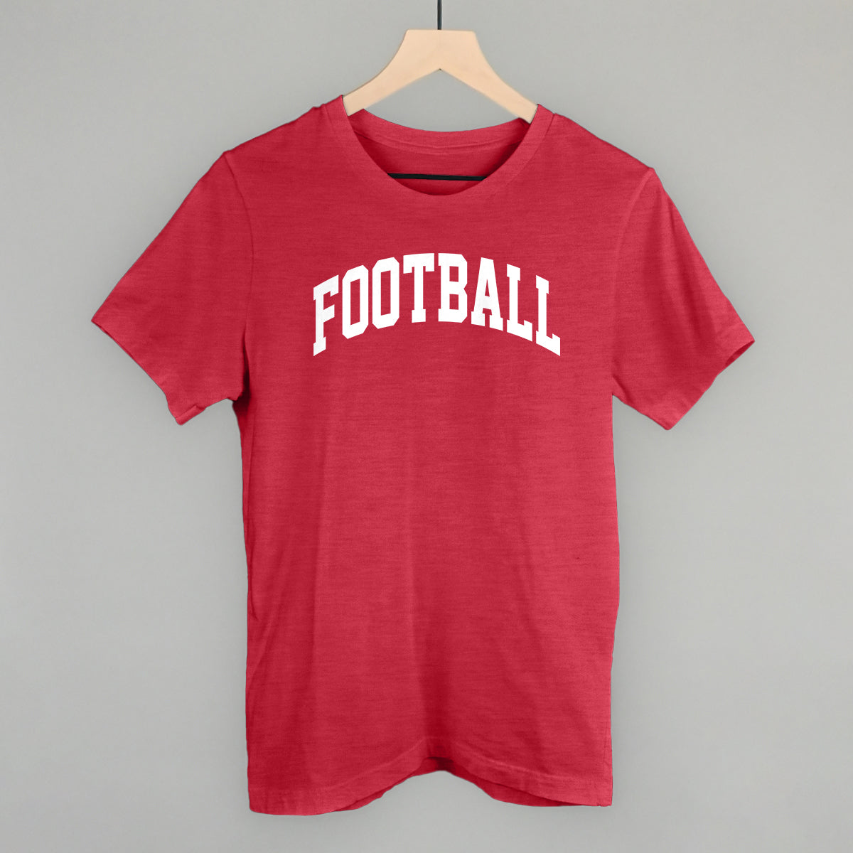 Football arch in white print on a heather red cotton tee