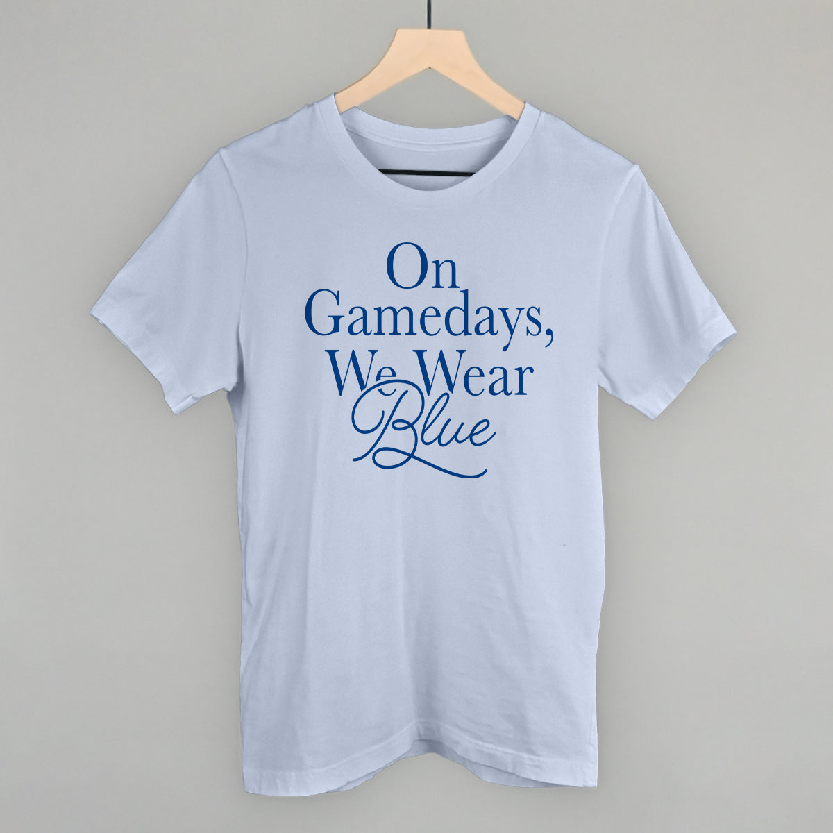 On Gamedays We Wear Blue design on a light blue cotton tee
