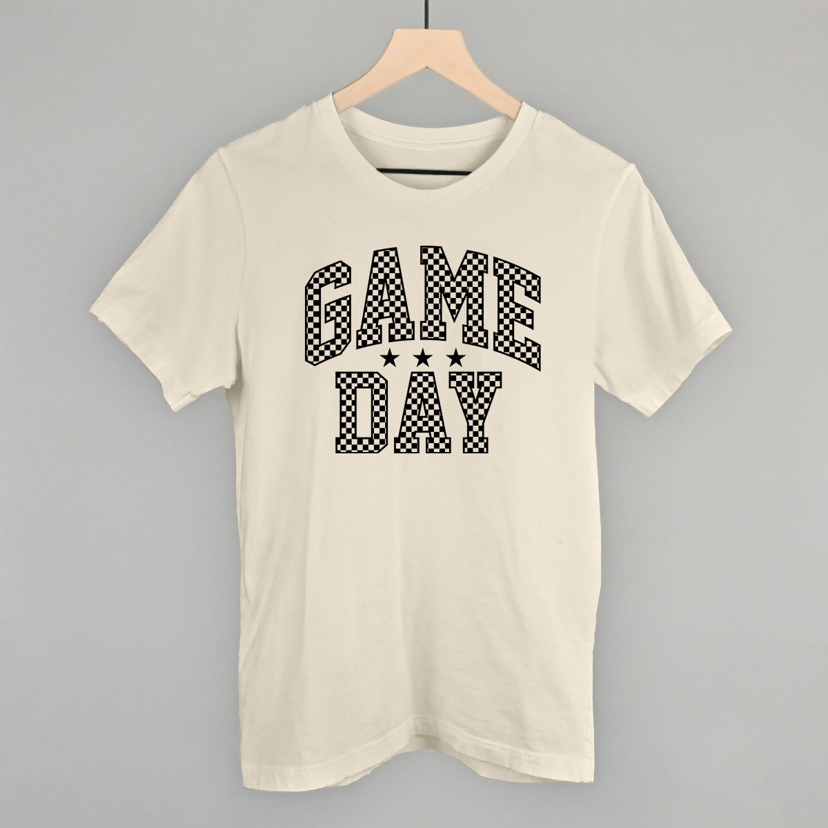 Game Day checkered arch design on a natural cotton tee