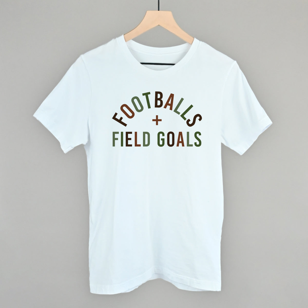 Footballs And Field Goals design on a white cotton tee