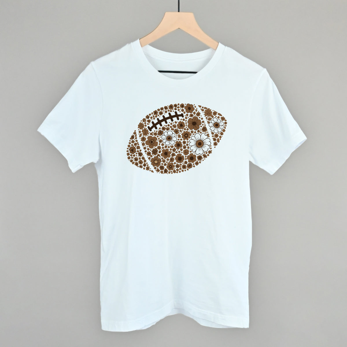 Brown floral football design on a white cotton tee