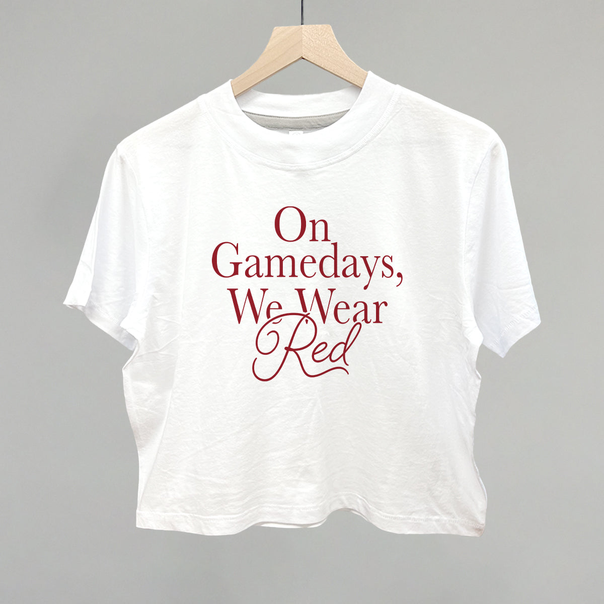 On Gamedays We Wear Red design on a white boxy tee