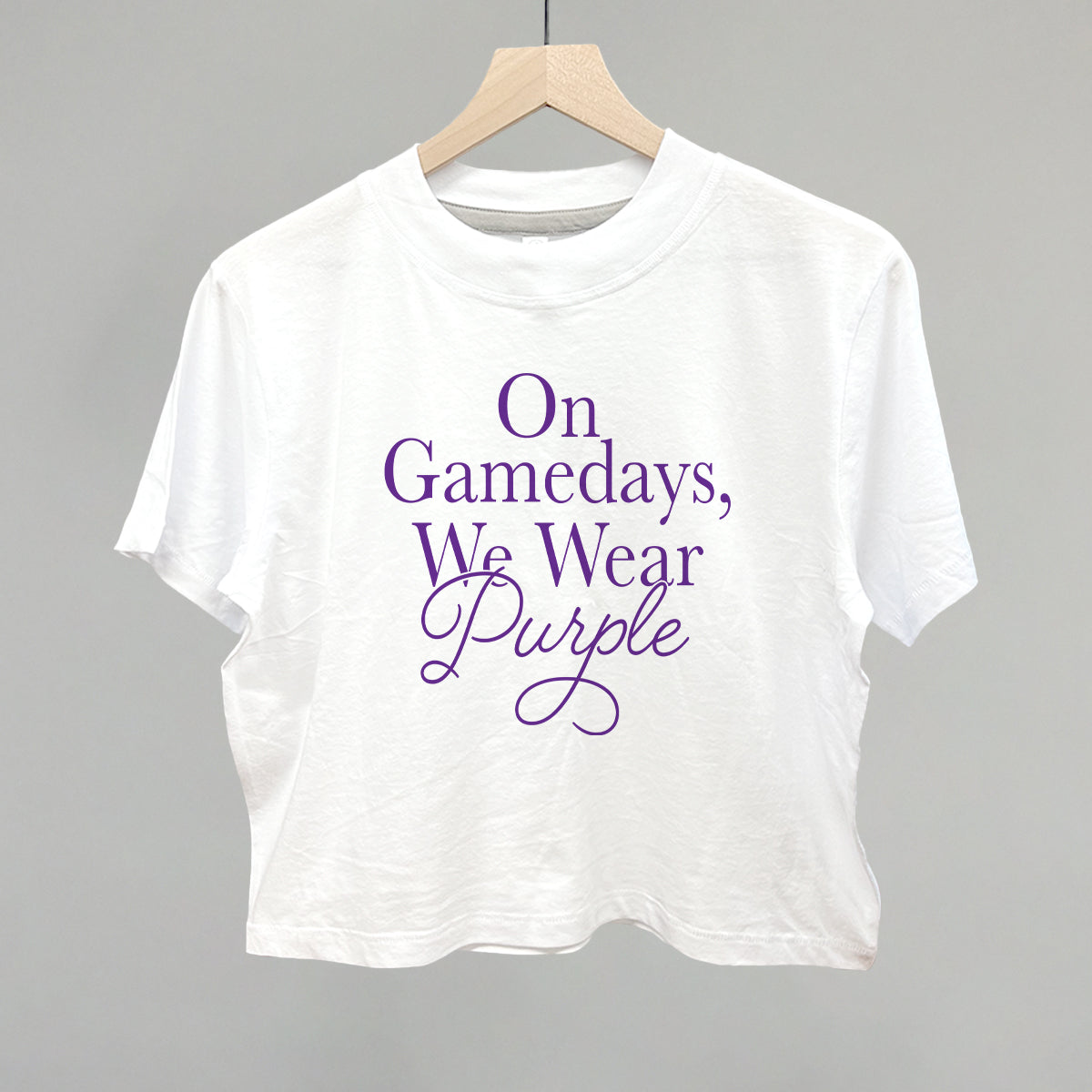 On Gamedays We Wear Purple design on a white boxy tee