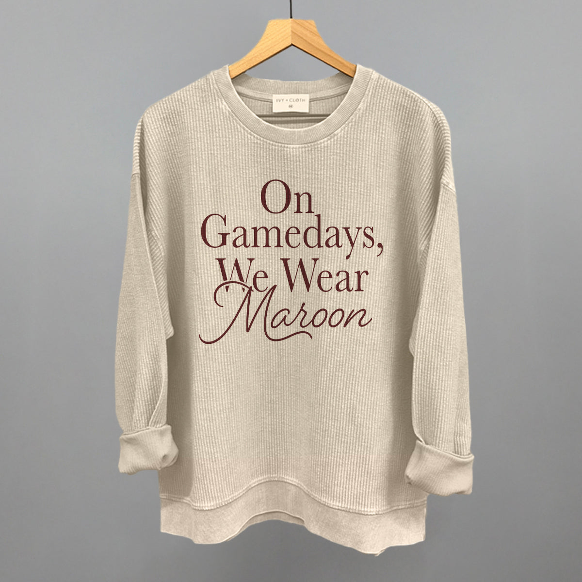On Gamedays We Wear Maroon design on a moonbeam oversized corded crew