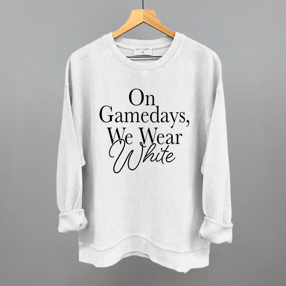 On Game Days We Wear White design on a white oversized corded crew