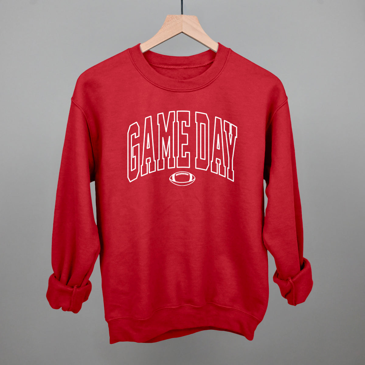 Game Day outlined arch design on a red fleece sweatshirt
