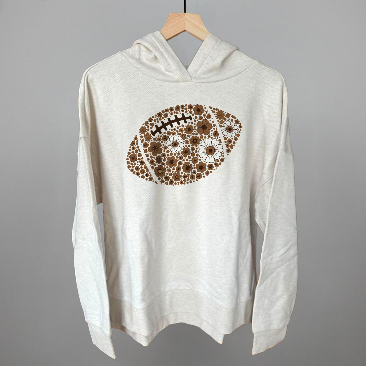 Brown floral football design shown in heather almond