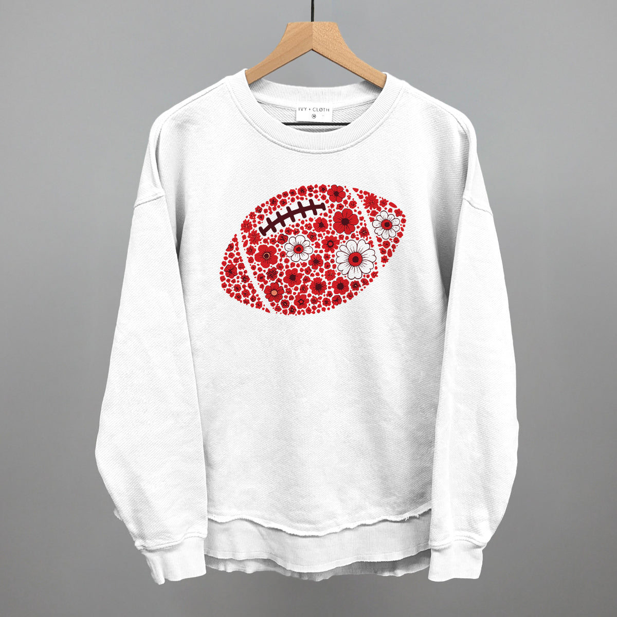 Red floral football design shown in white