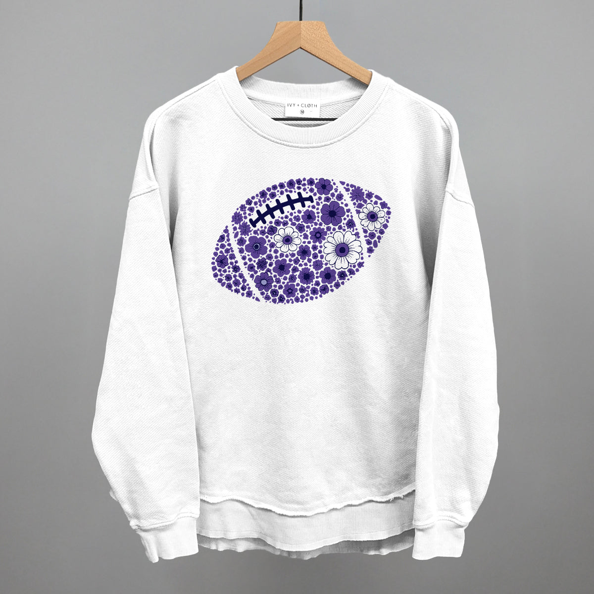Purple floral football design shown in white