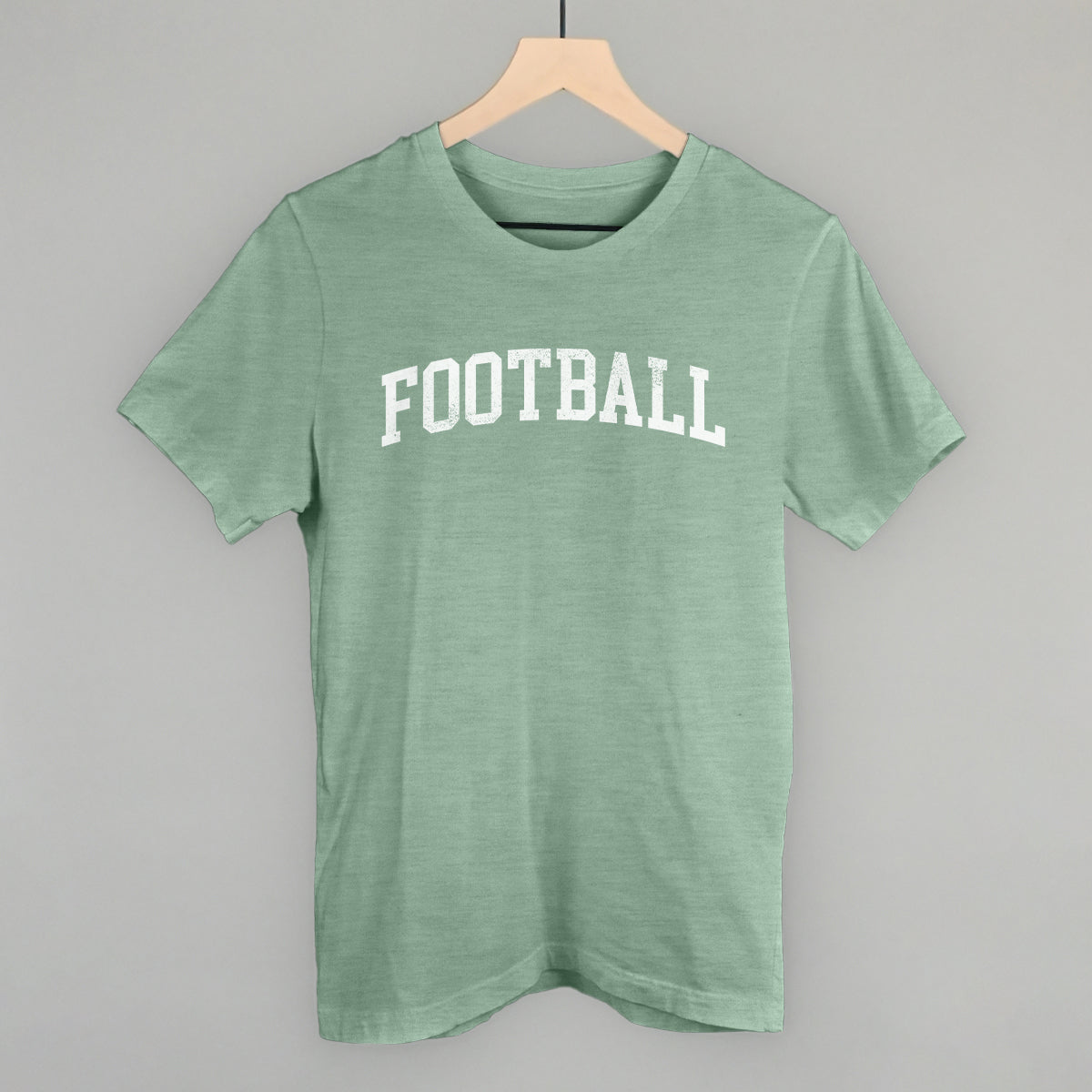 Distressed collegiate football design on a heather sage cotton tee
