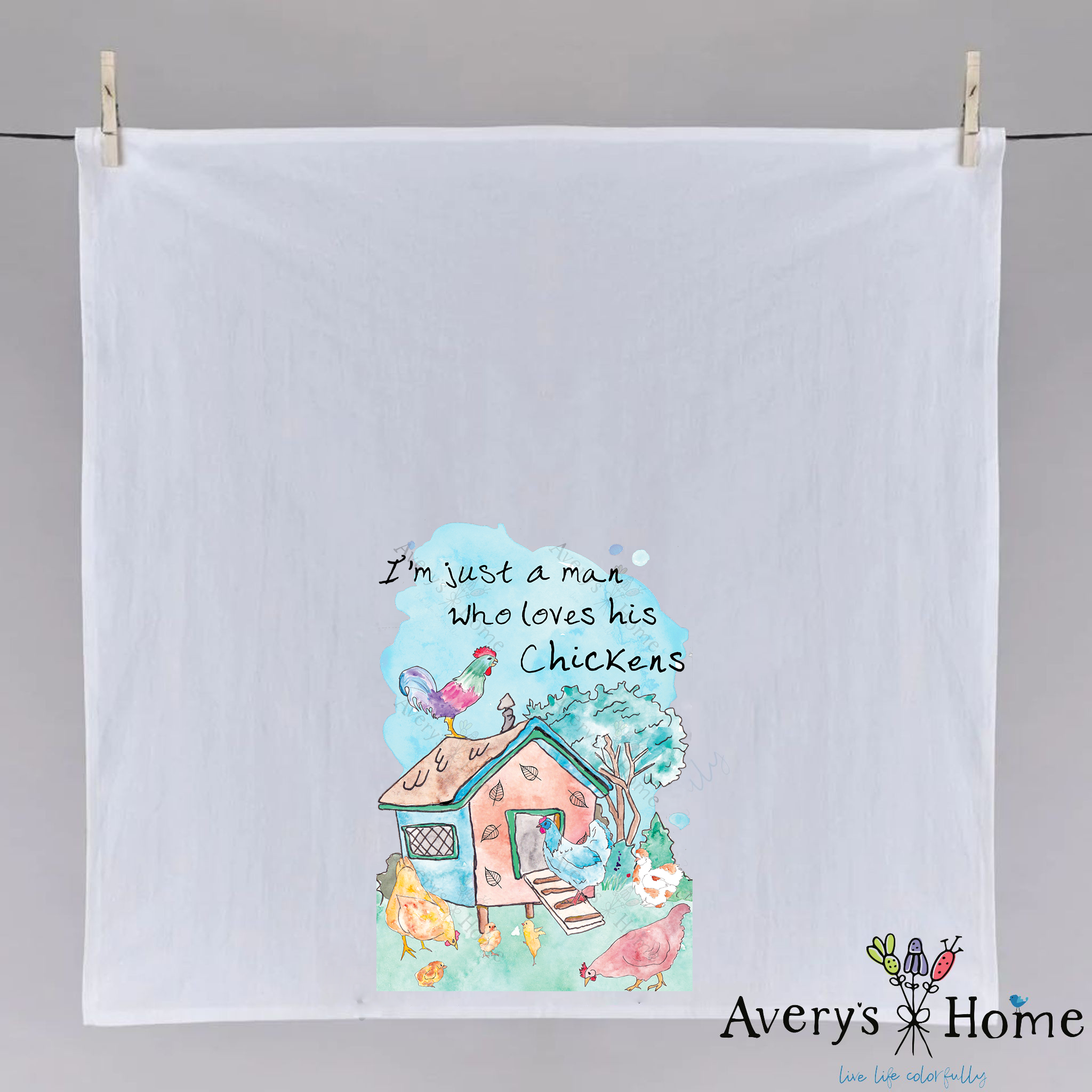 Man Who Loves Chickens dish towel hanging in the kitchen