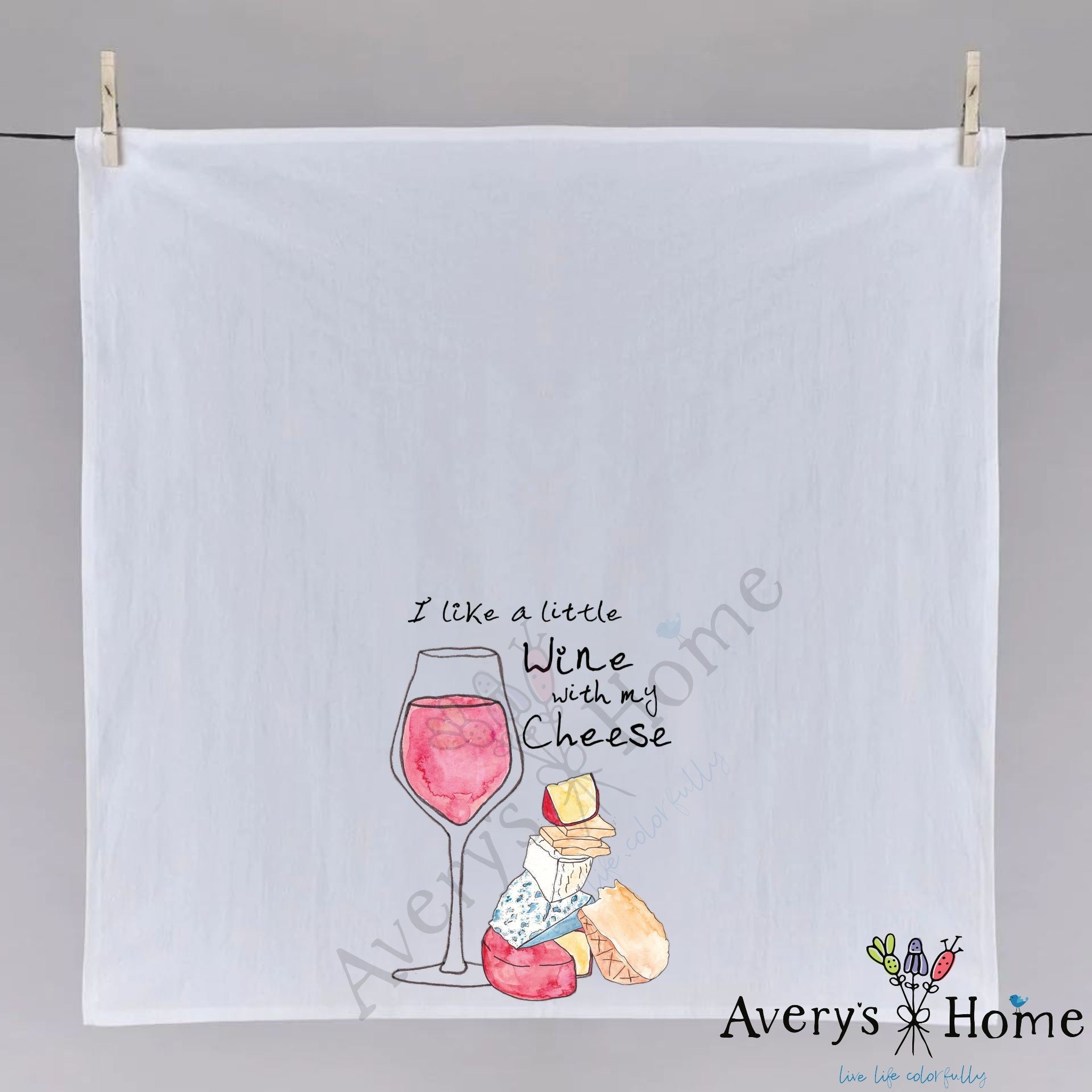 I Like a Little Wine with My Cheese dish towel hanging in the kitchen