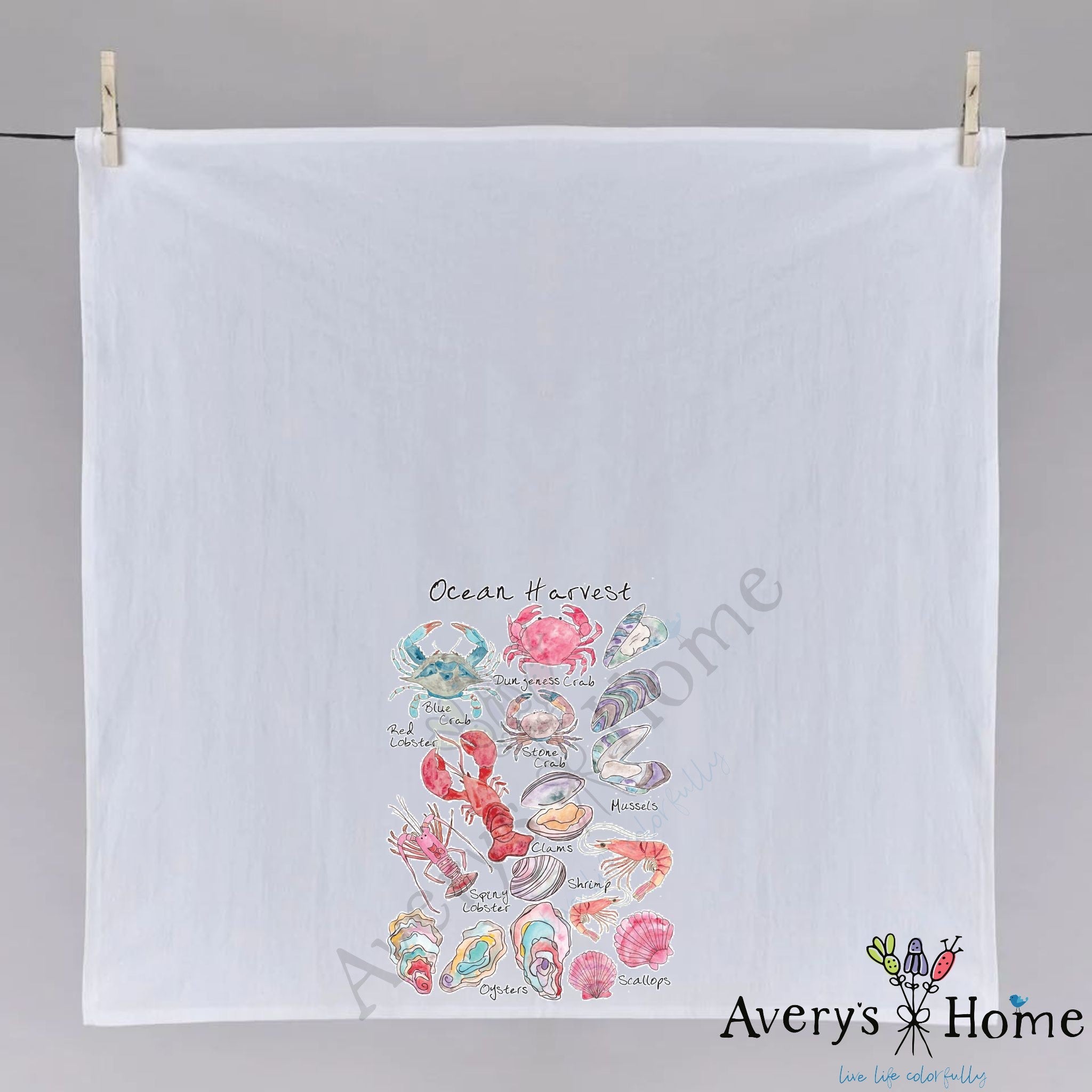 Ocean Harvest dish towel hanging in the kitchen