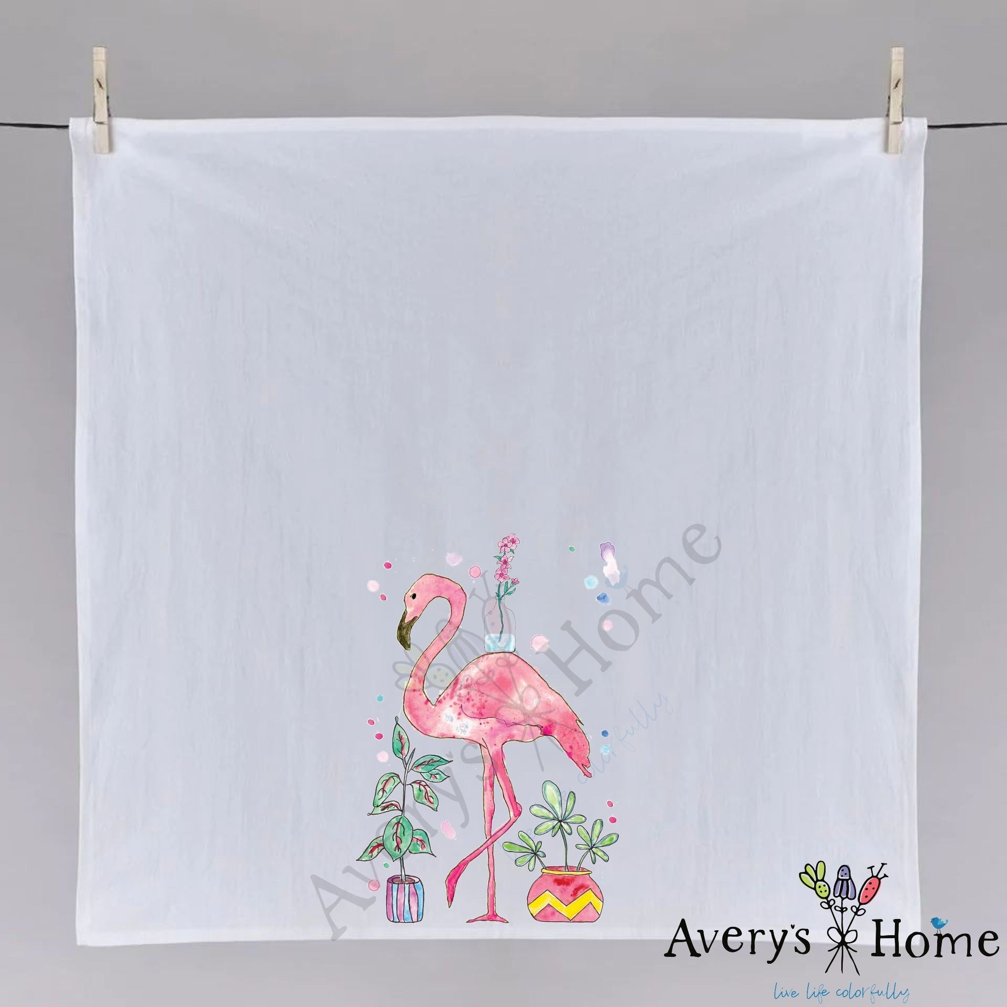 Happy Flamingo with Plants dish towel hanging in the kitchen