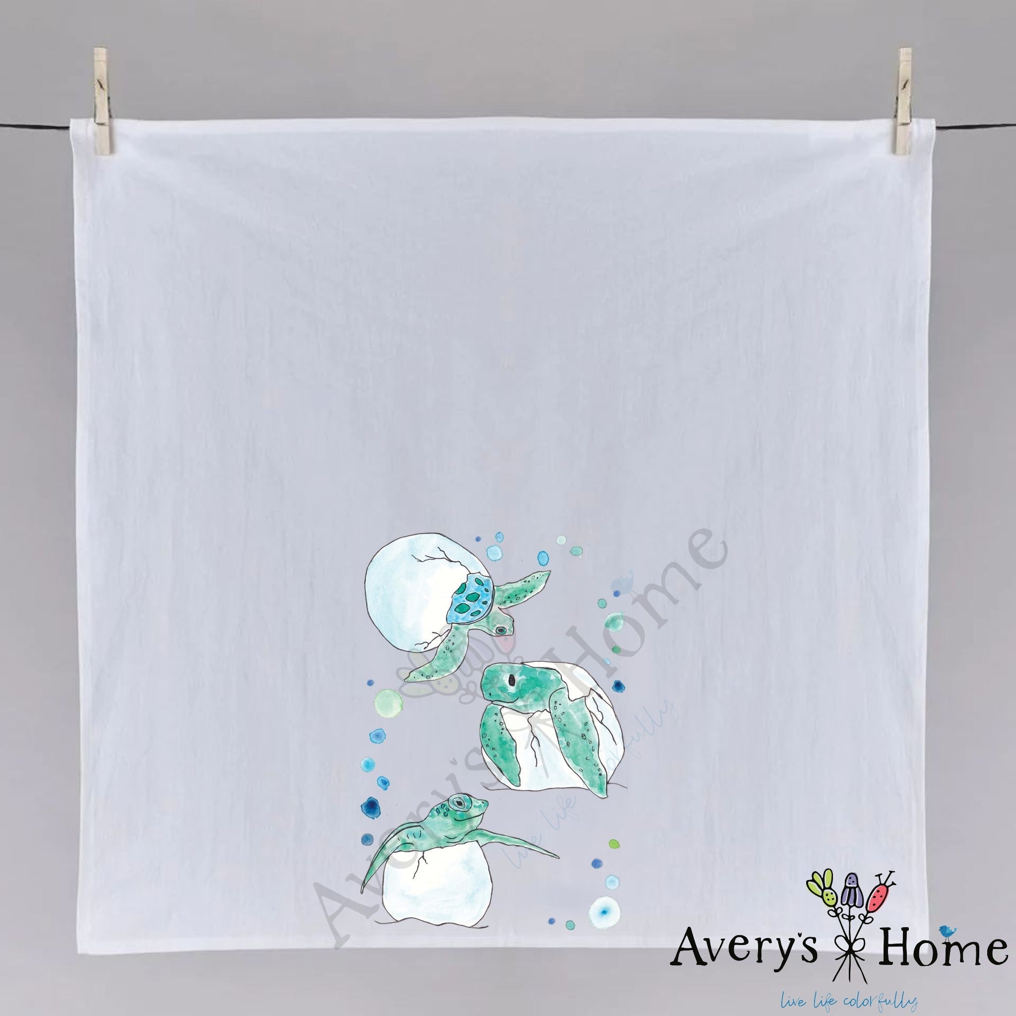 Baby Turtle Eggs dish towel hanging in the kitchen