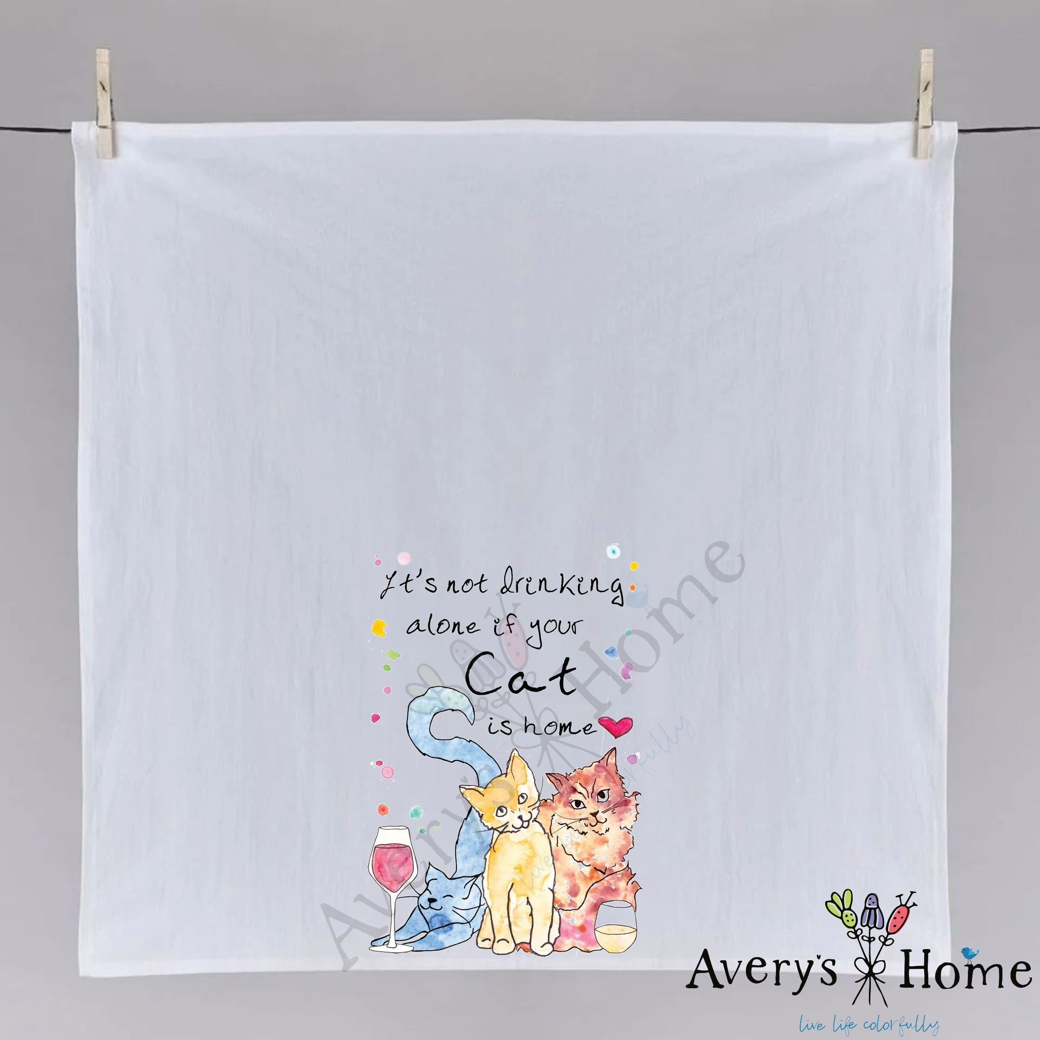 Cat Drinking Buddy dish towel hanging in the kitchen