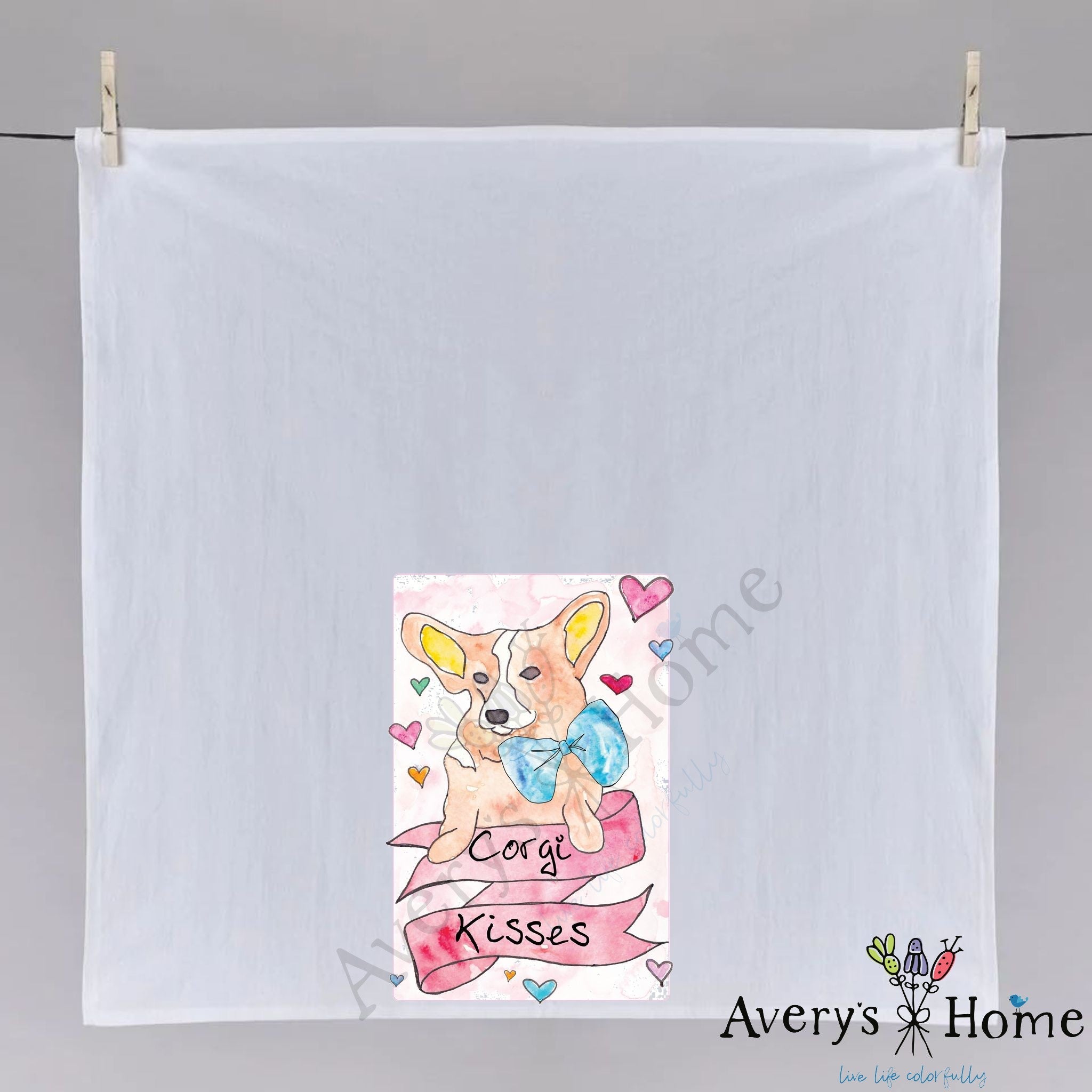 Corgi Kisses dish towel hanging in the kitchen