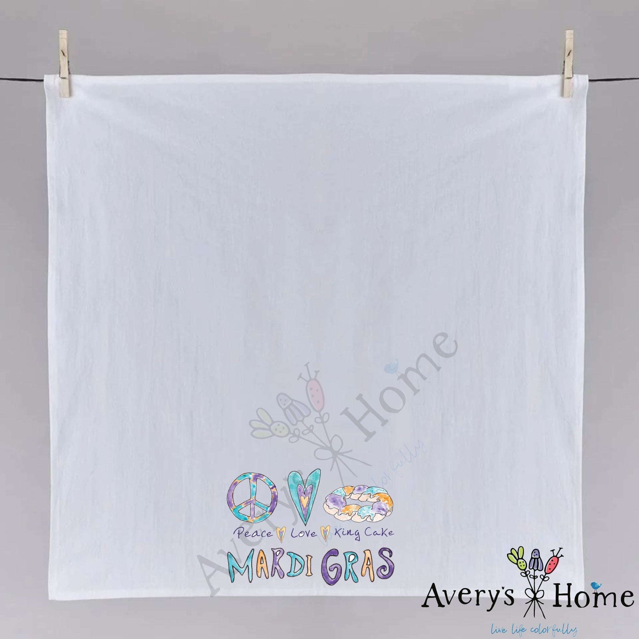 Peace Love Mardi Gras dish towel folded, hemmed on all four sides