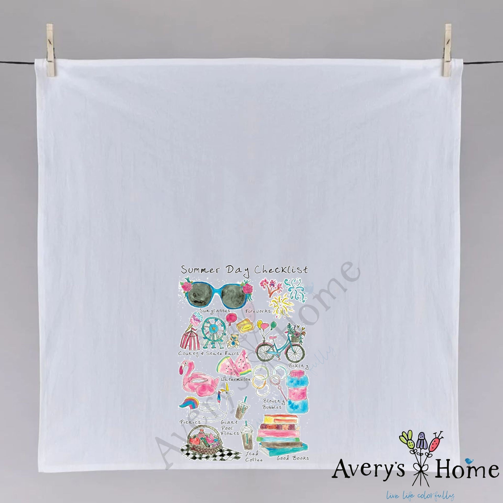 Summer Checklist dish towel hanging in the kitchen