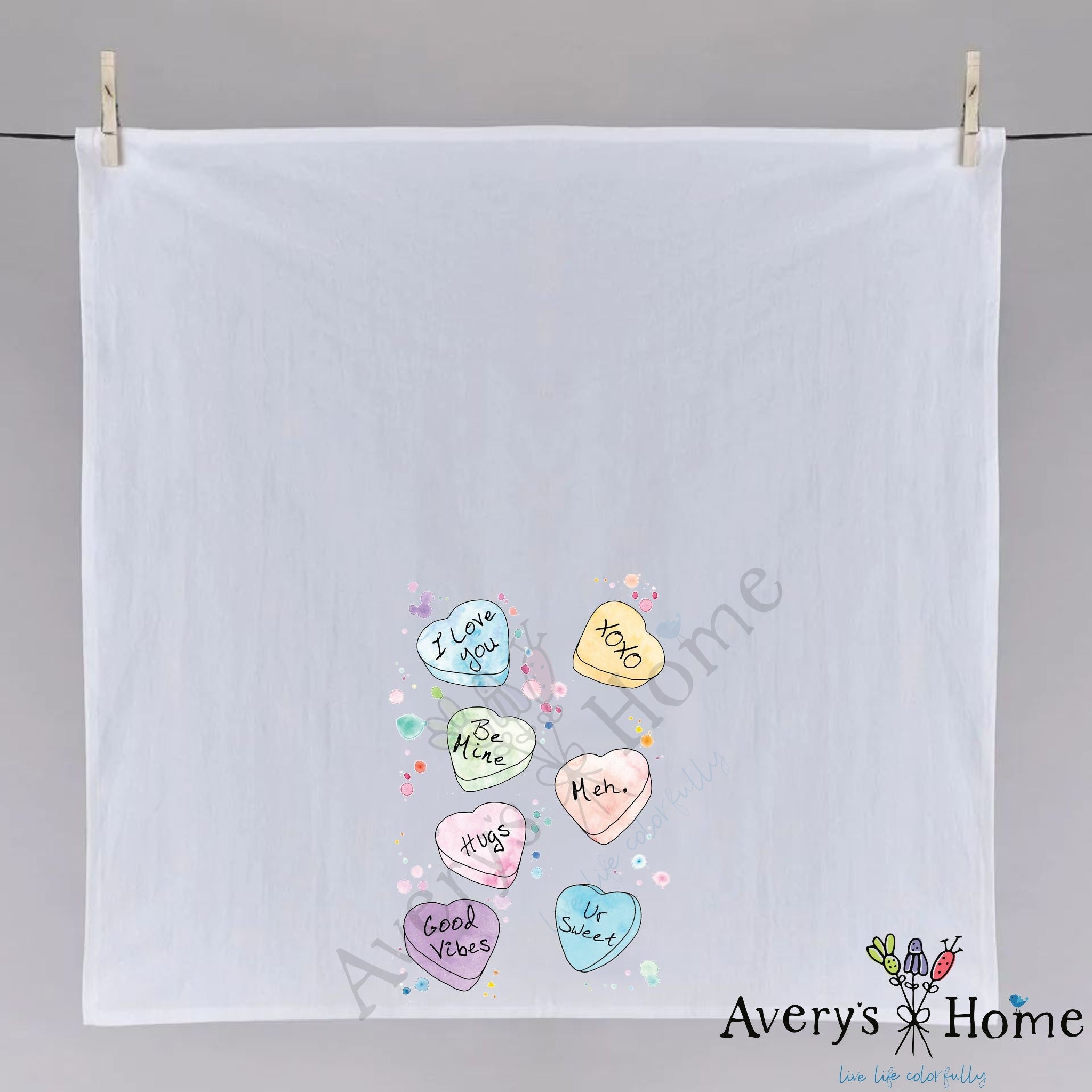 Valentine's Conversation Hearts dish towel hanging in the kitchen