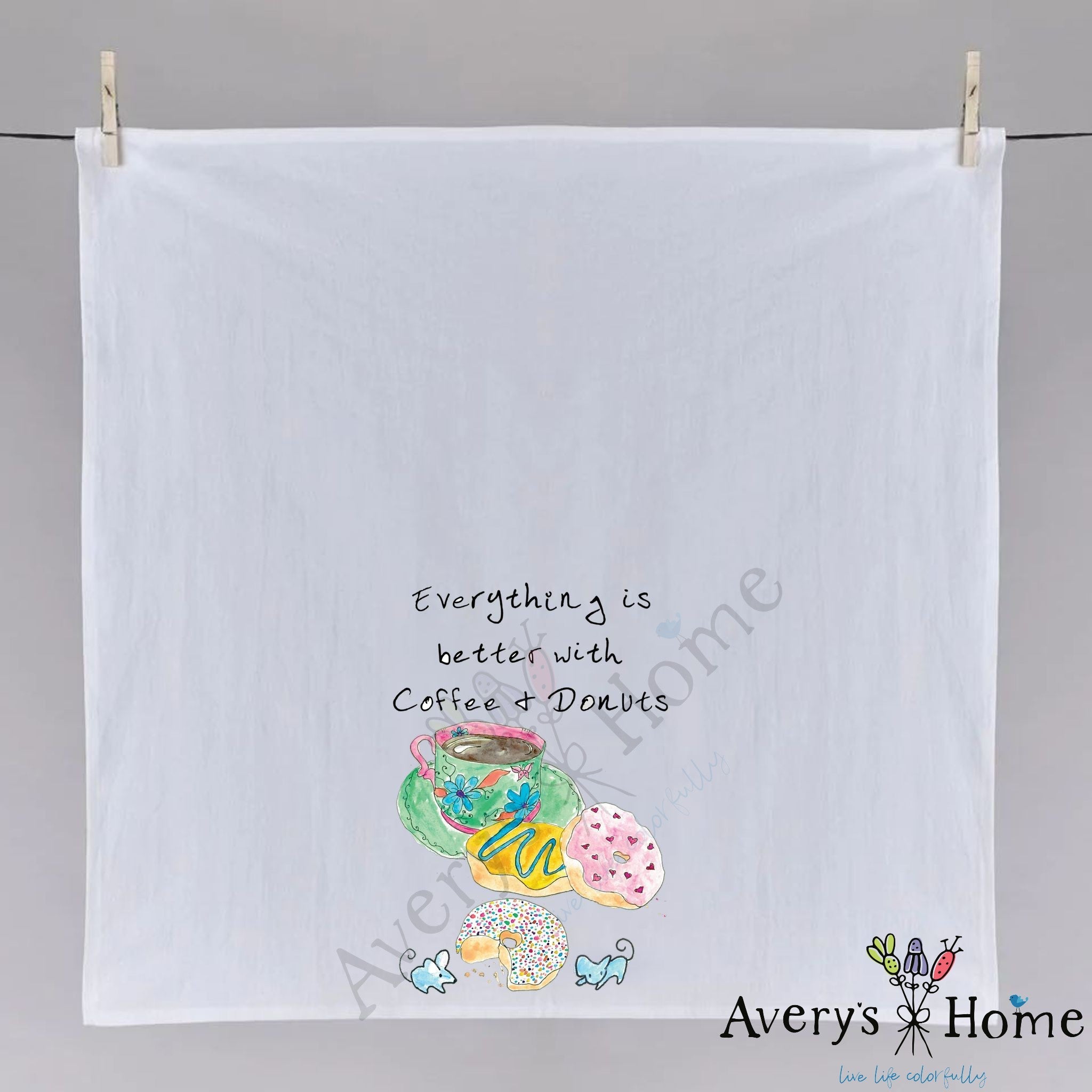 Coffee and Donuts dish towel hanging in the kitchen
