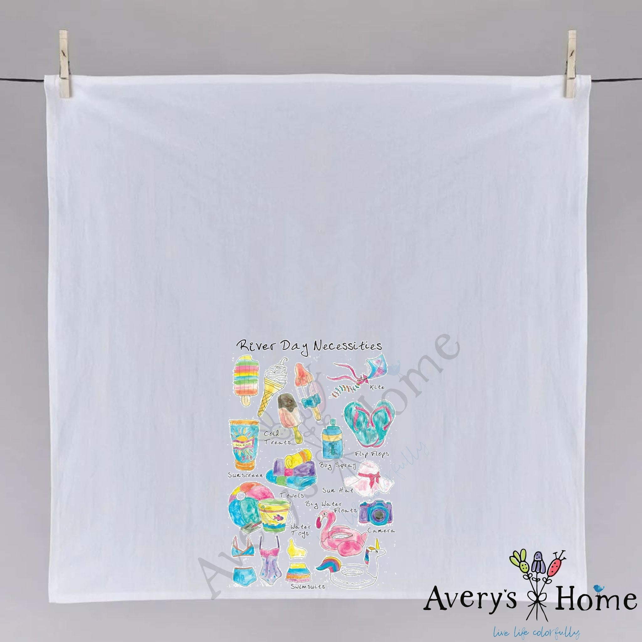 River Day Necessities dish towel hanging in the kitchen