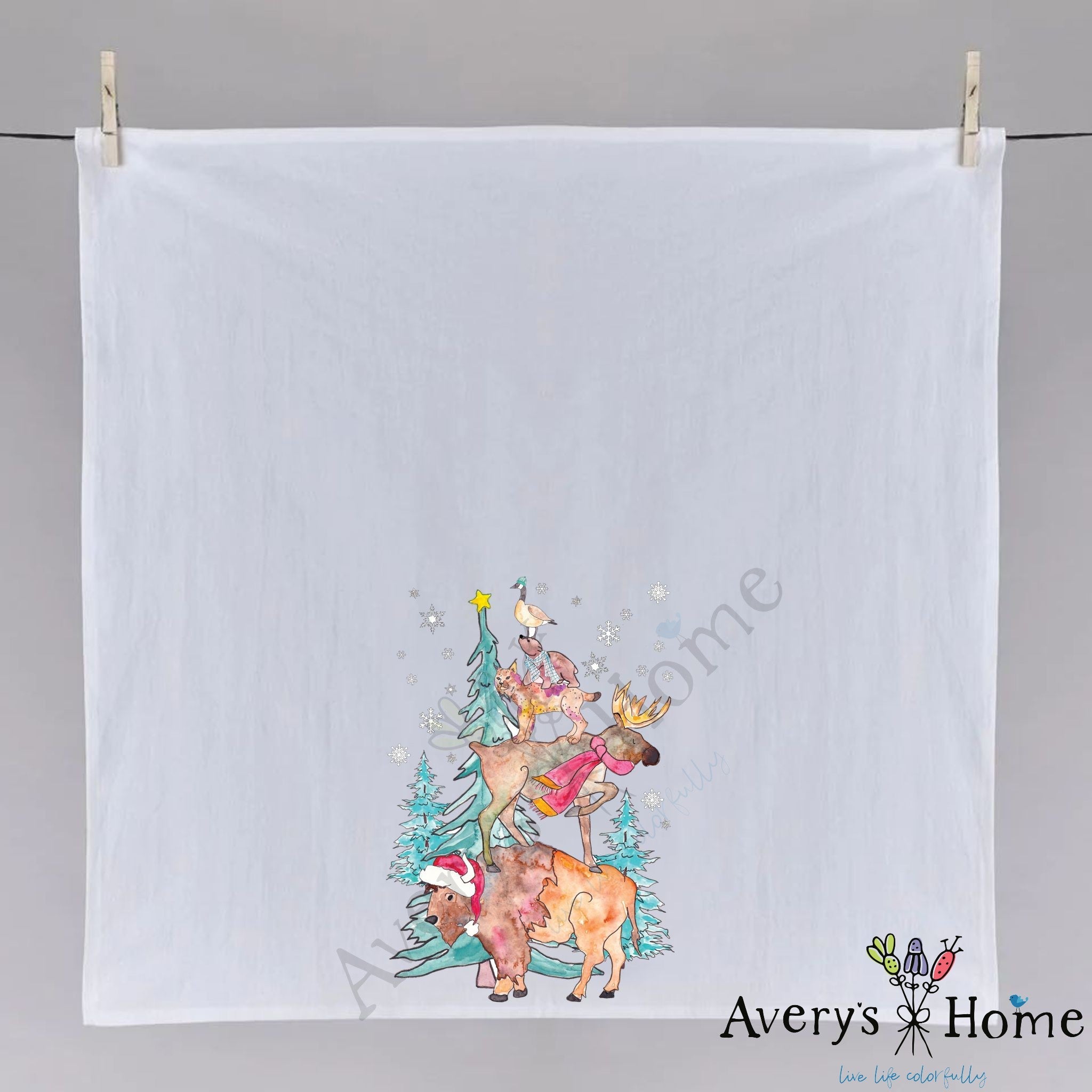 Woodland Animals Christmas Tree dish towel hanging in the kitchen