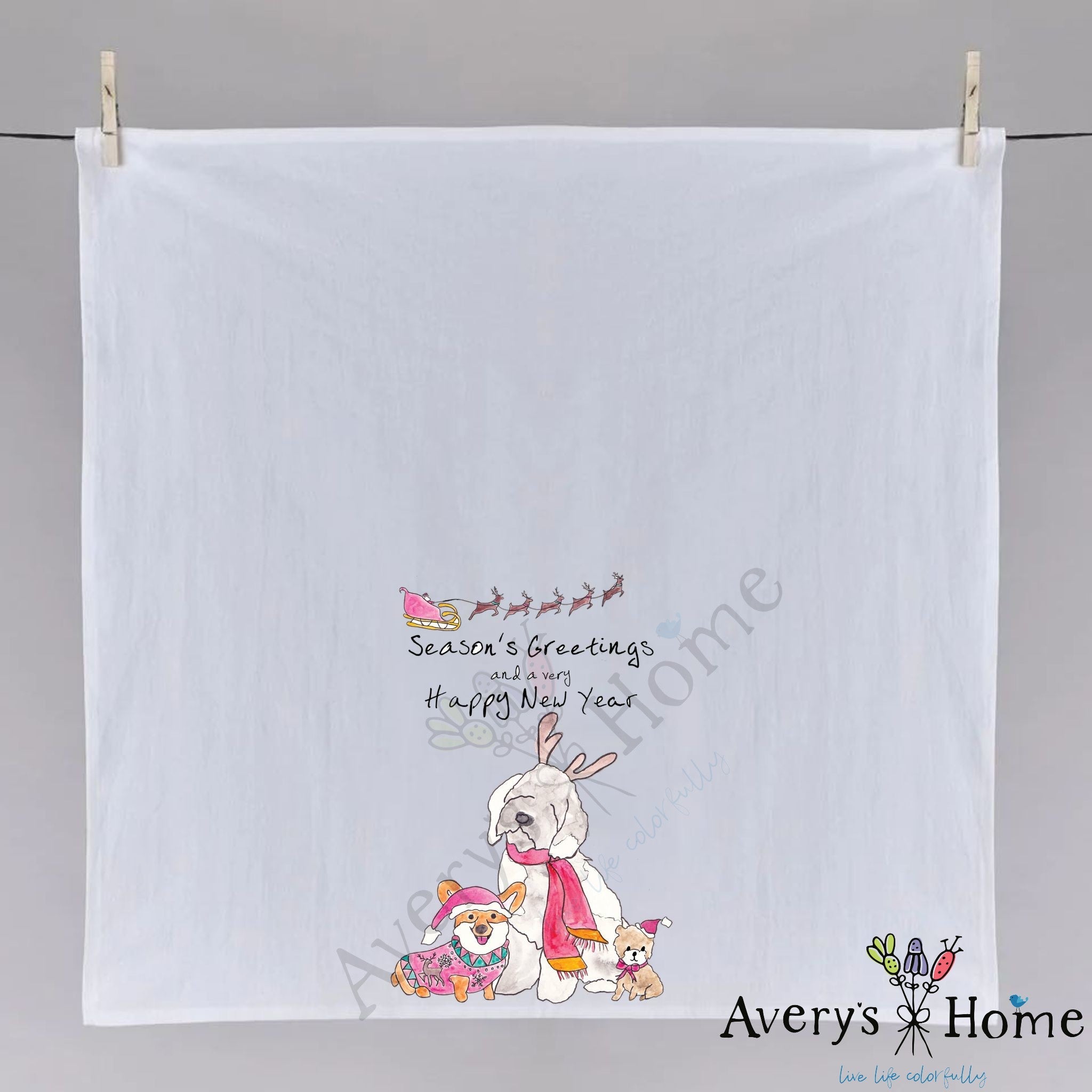 Season's Greetings and Happy New Year dish towel hanging in the kitchen