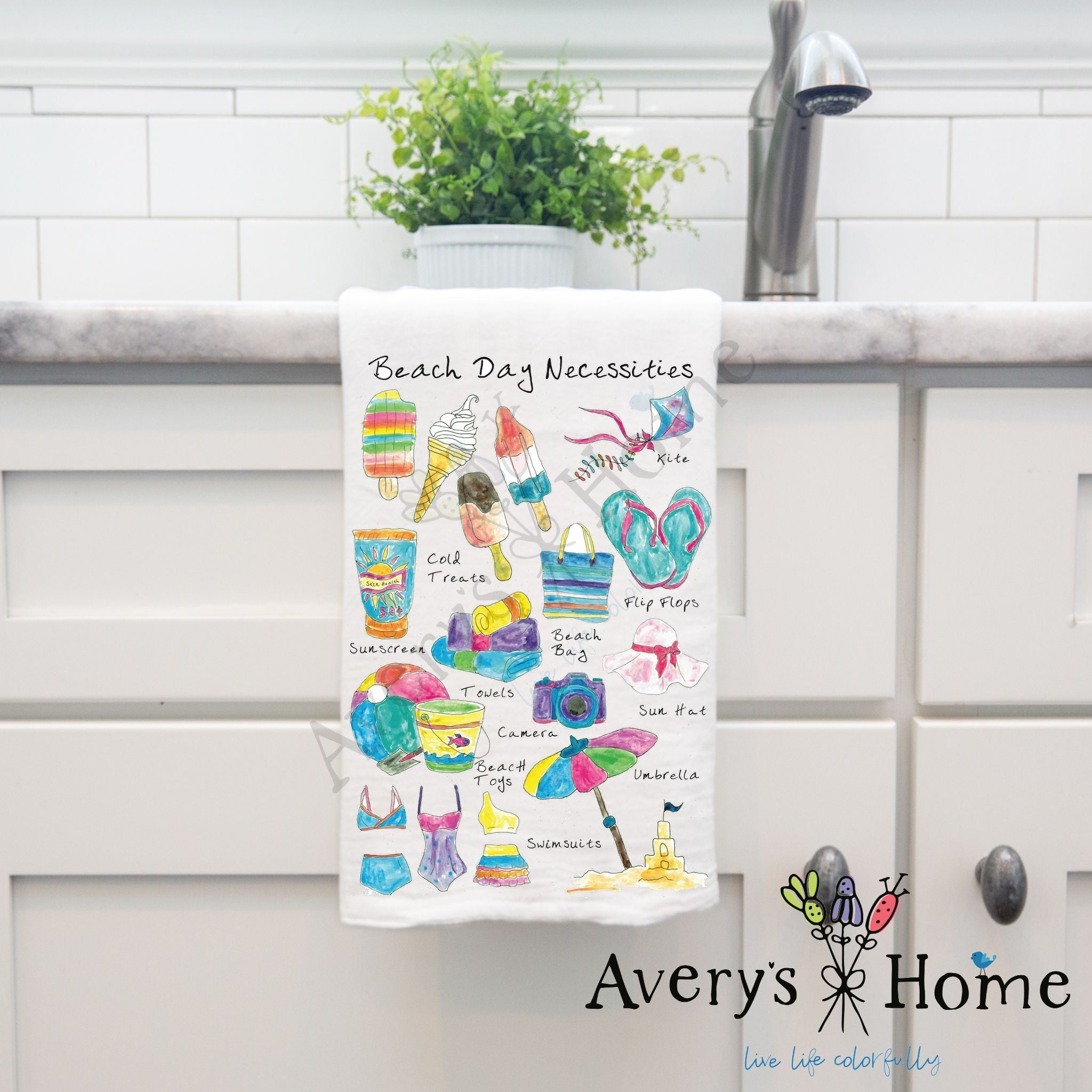 Beach Day Necessities dish towel hanging by kitchen sink