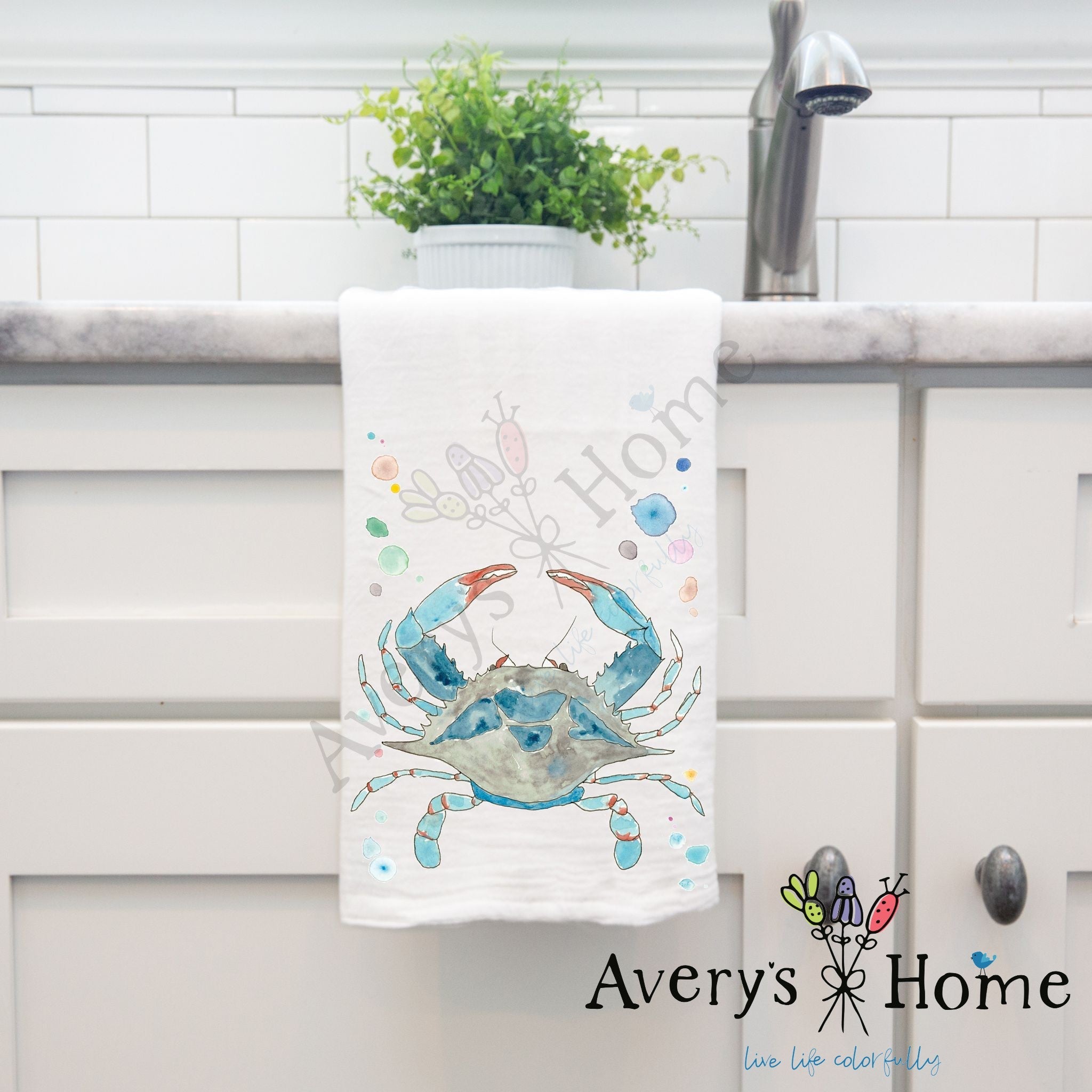 Blue Crab dish towel hanging in the kitchen