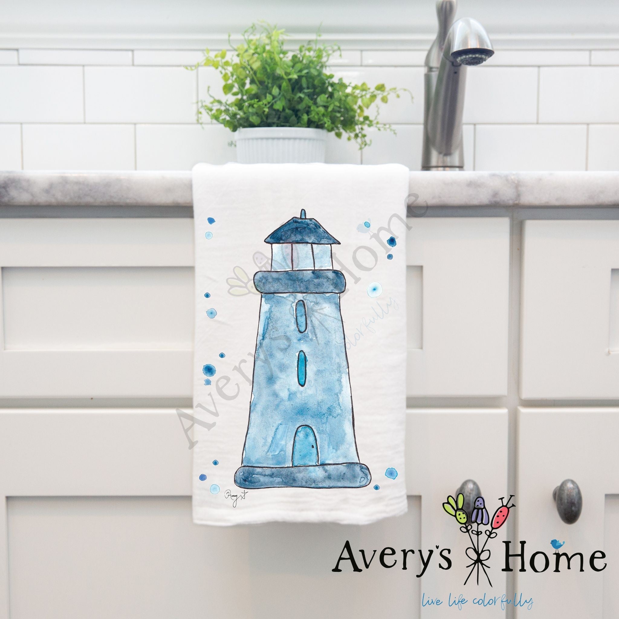 Navy Lighthouse dish towel hanging in the kitchen