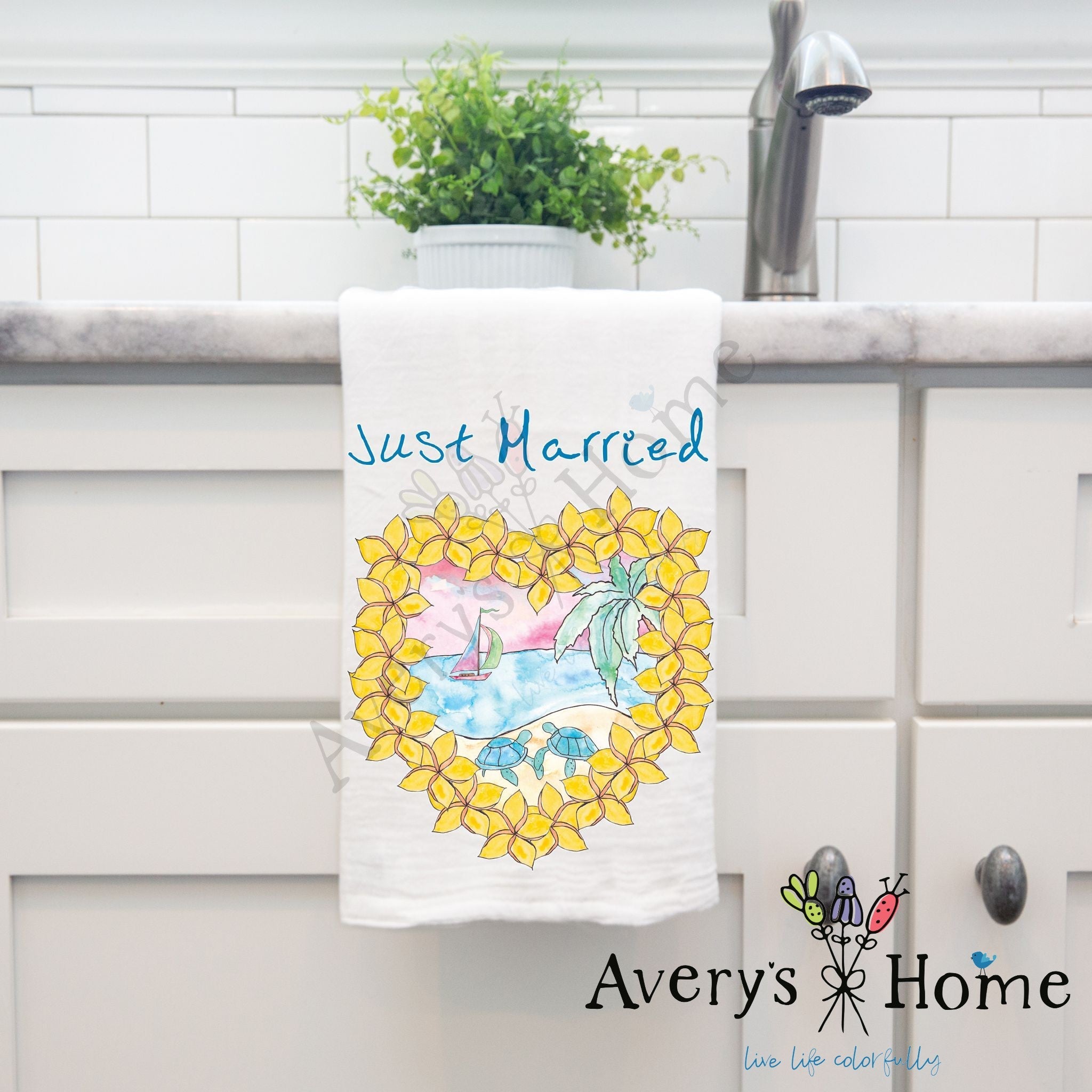 Just Married dish towel hanging by kitchen sink