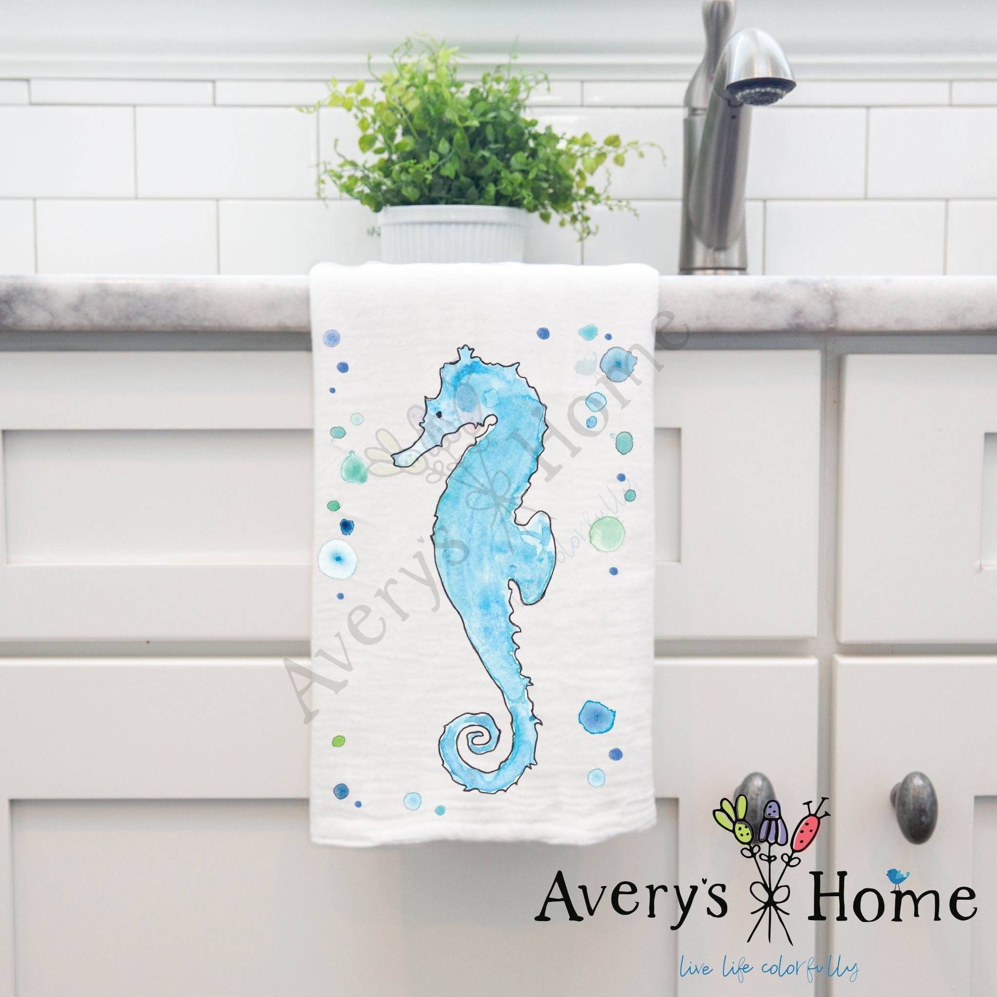Seahorse dish towel hanging in the kitchen