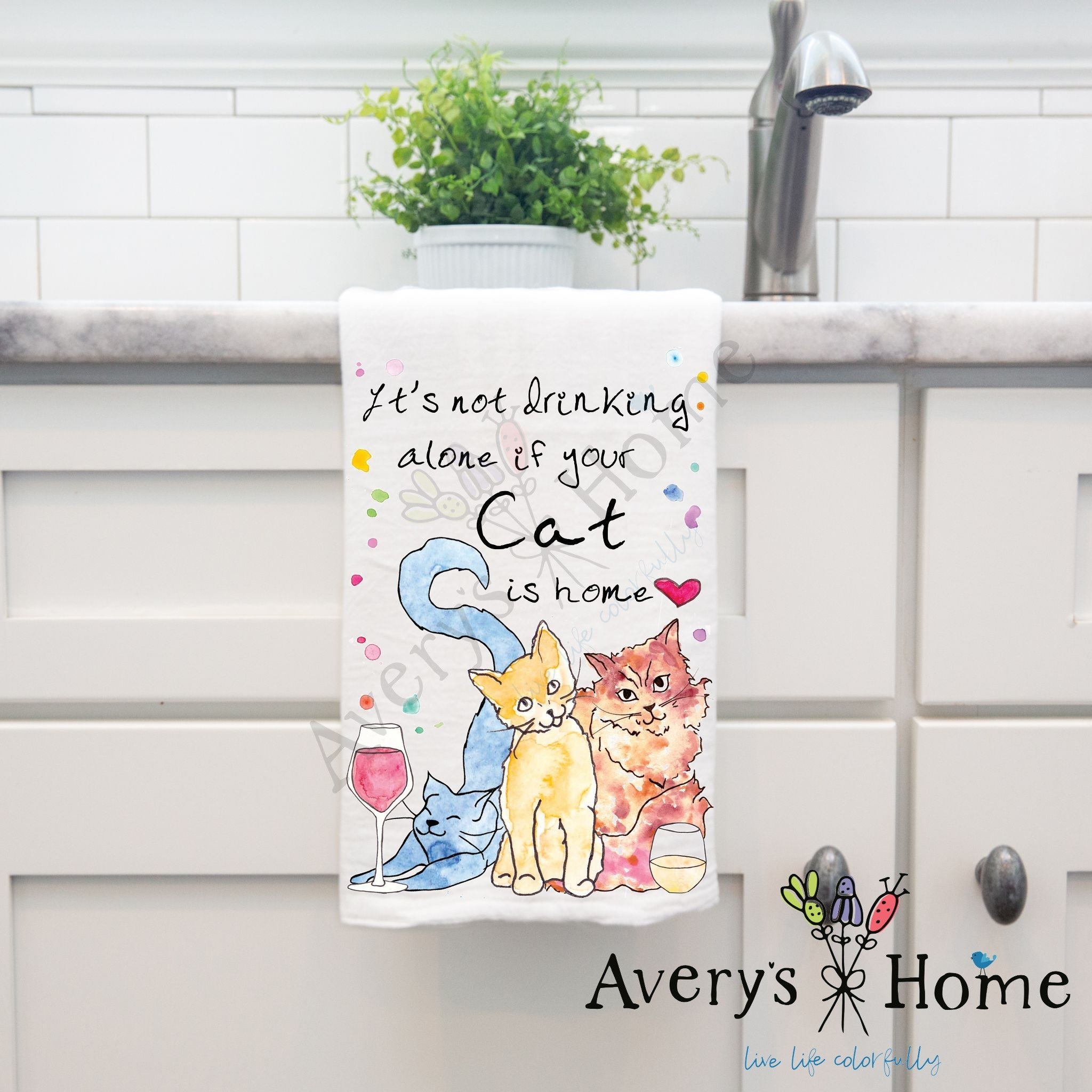 Cat Drinking Buddy dish towel hanging by kitchen sink