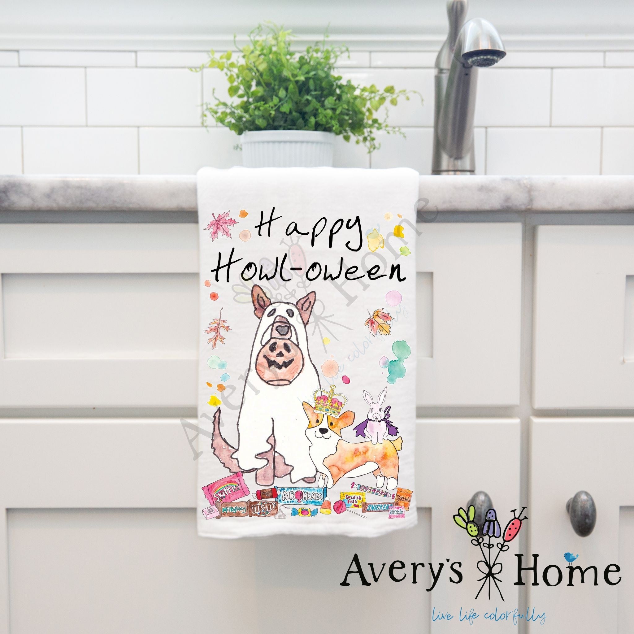 Happy Halloween with Dogs dish towel hanging by kitchen sink