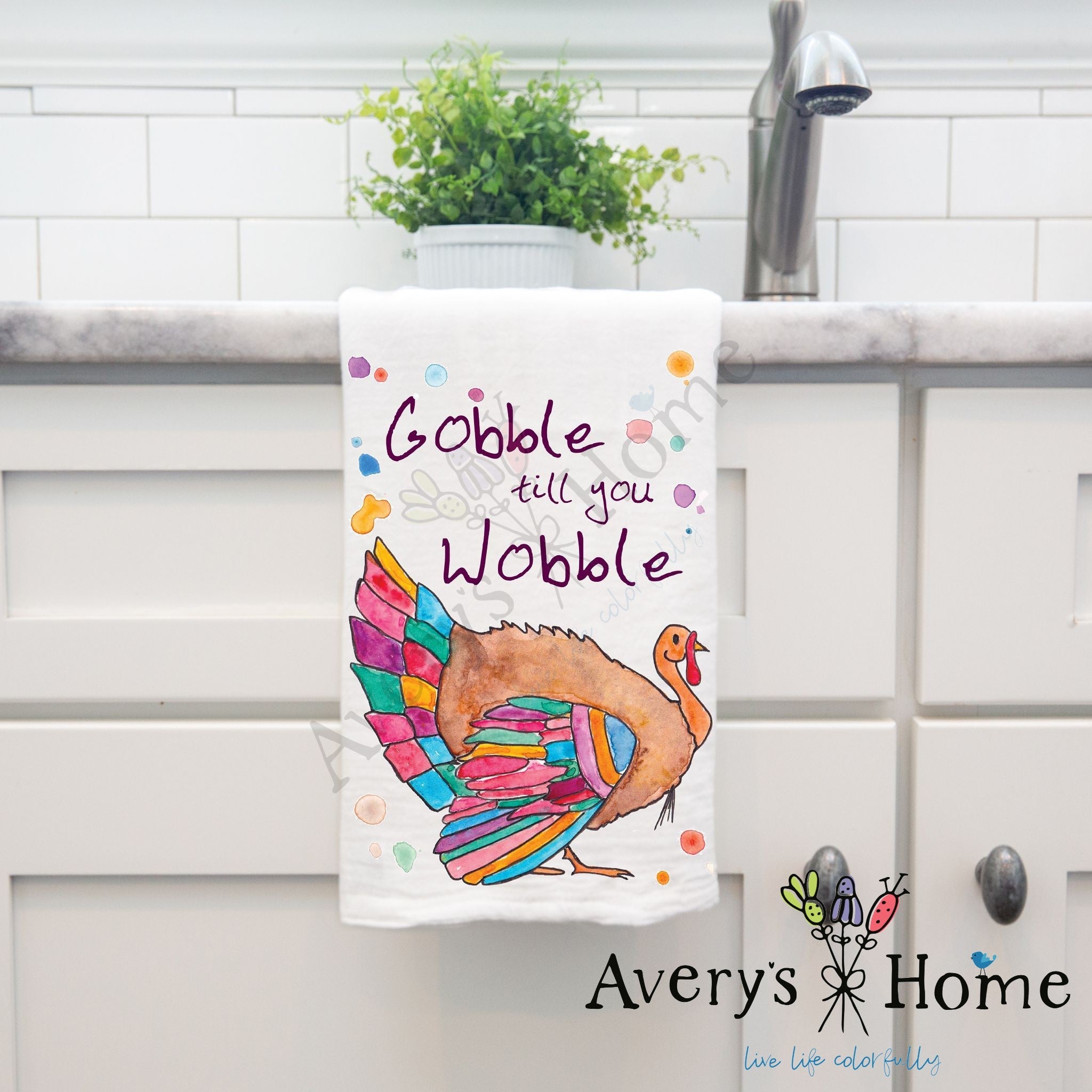 Gobble Till You Wobble dish towel hanging by kitchen sink