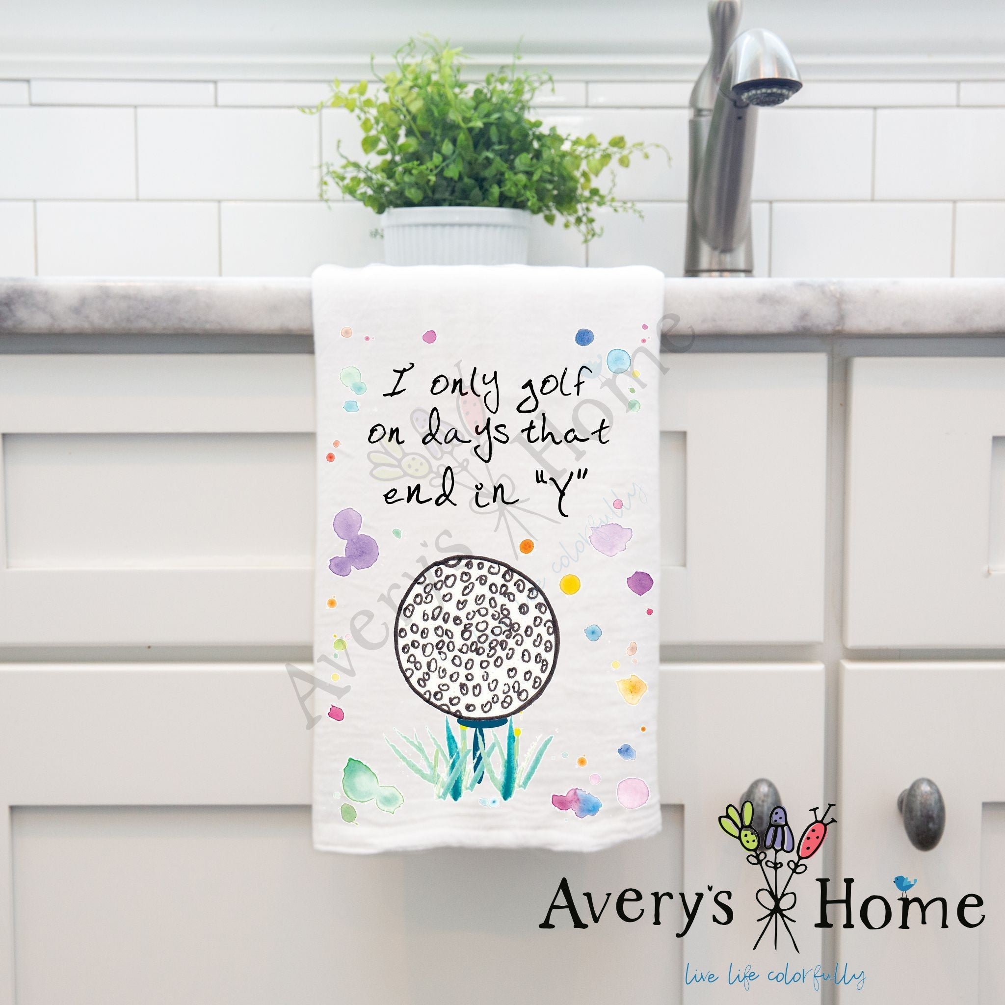 Golfing on Days that End in "Y" dish towel hanging in the kitchen