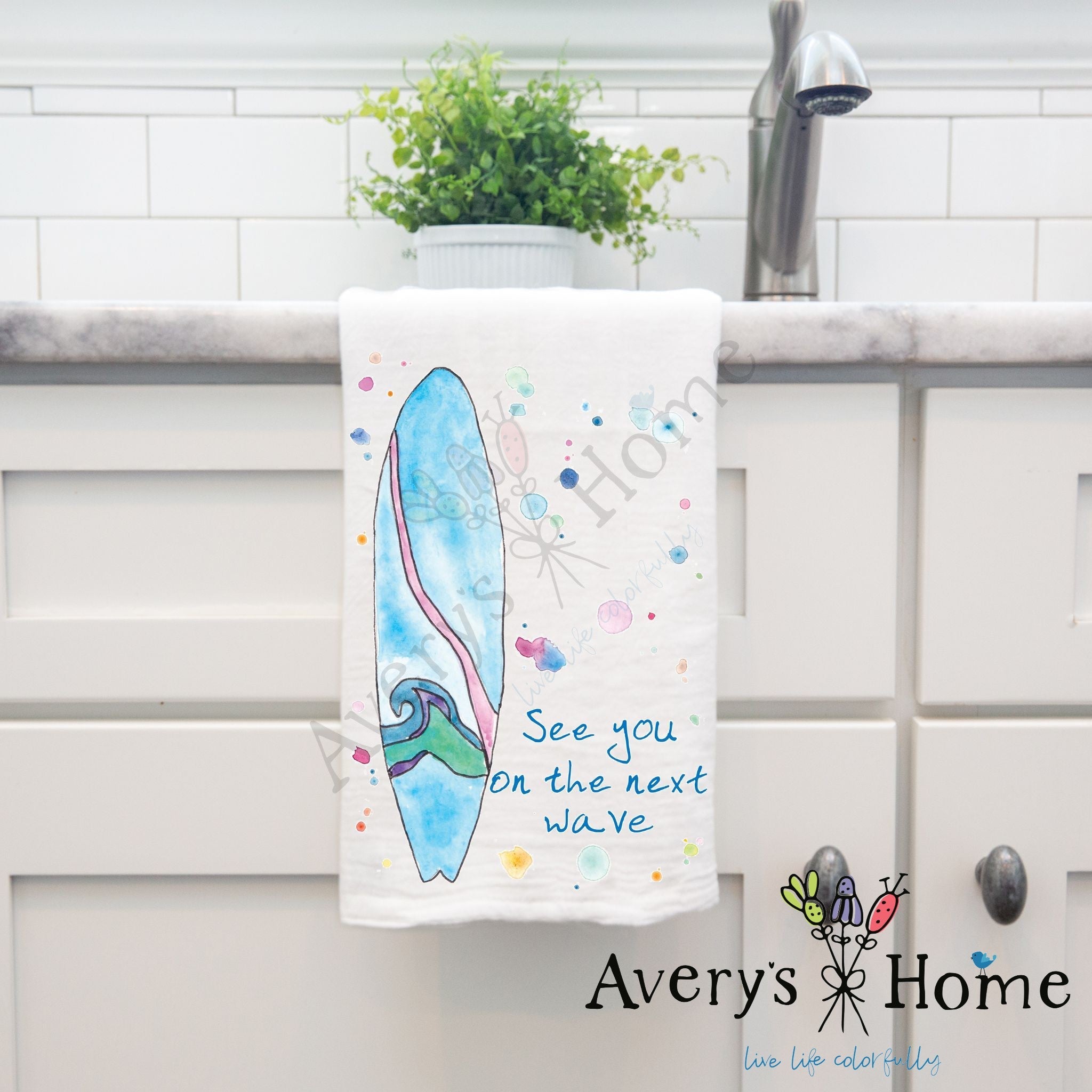 Surfing Next Wave dish towel hanging in the kitchen