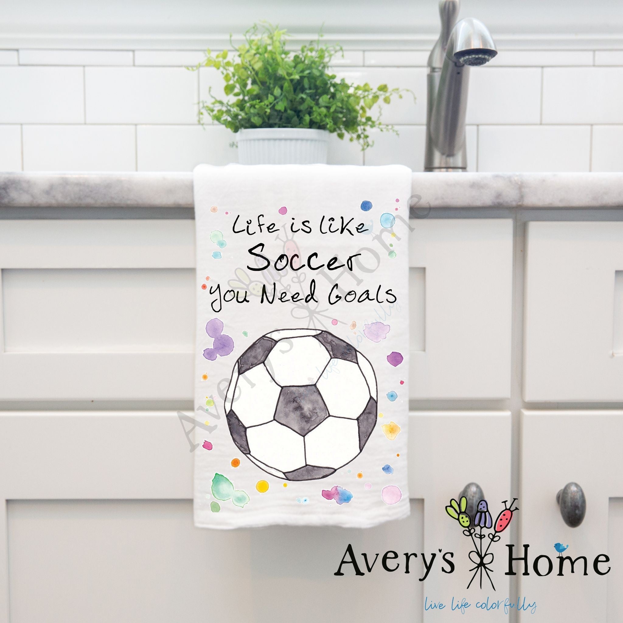 Soccer Life Goals dish towel hanging in the kitchen