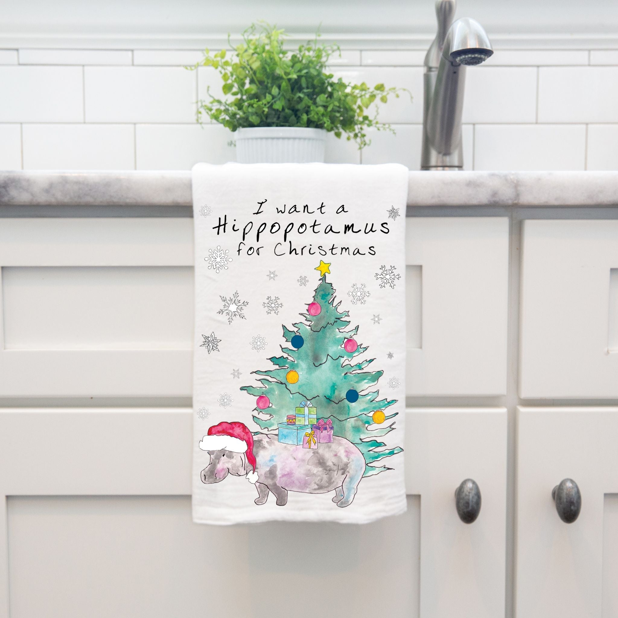 Hippo for Christmas dish towel hanging by kitchen sink